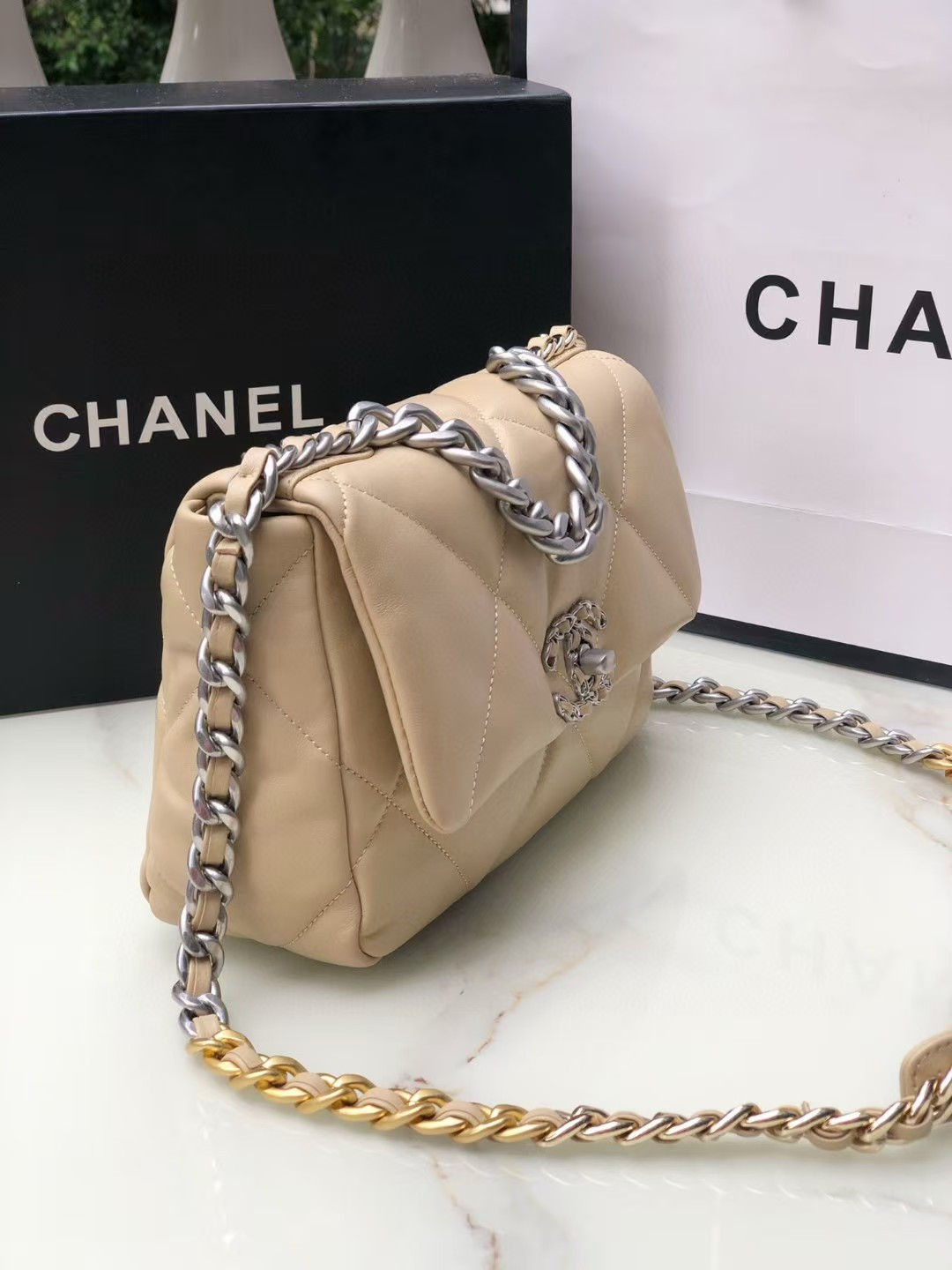 CHANEL 19 HANDBAG Shiny Leather, Gold-Tone, Silver-Tone & Ruthenium-Finish Metal Beige 26x16x9cm