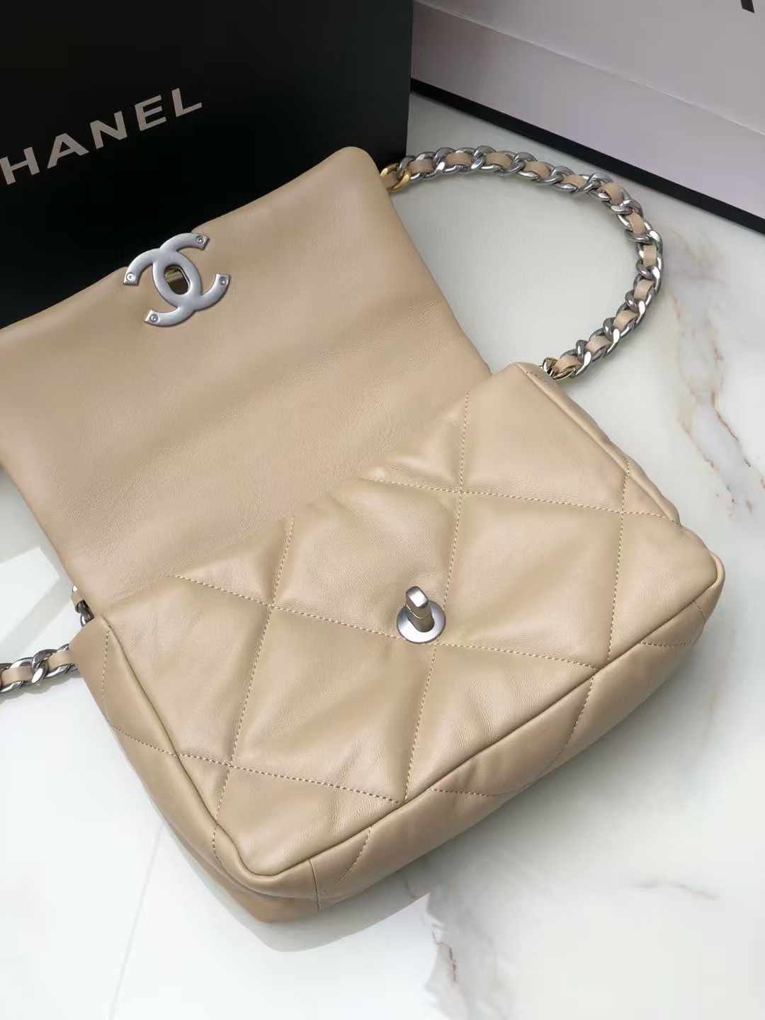 CHANEL 19 HANDBAG Shiny Leather, Gold-Tone, Silver-Tone & Ruthenium-Finish Metal Beige 26x16x9cm