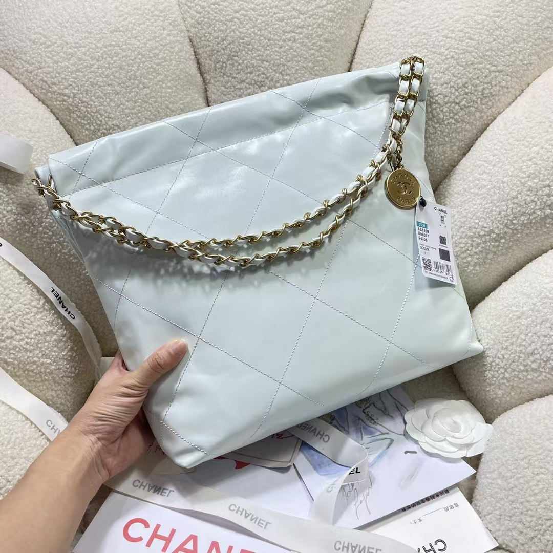 CHANEL 22 SMALL HANDBAG Shiny Calfskin Light Blue 37X35X7cm