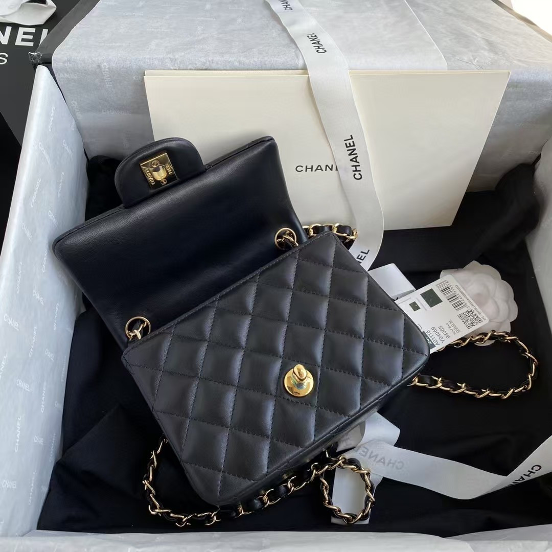 Chanel Mini Classic Handbag Lambskin & Gold-Tone Metal Black 5.3 × 6.6 × 3.1 in