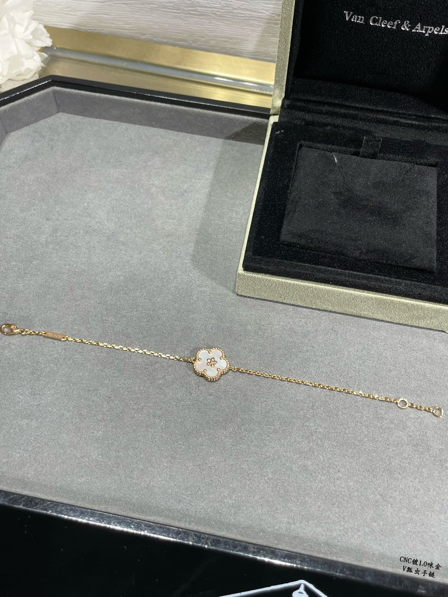 Van Cleef & Arpels plum blossom bracelet