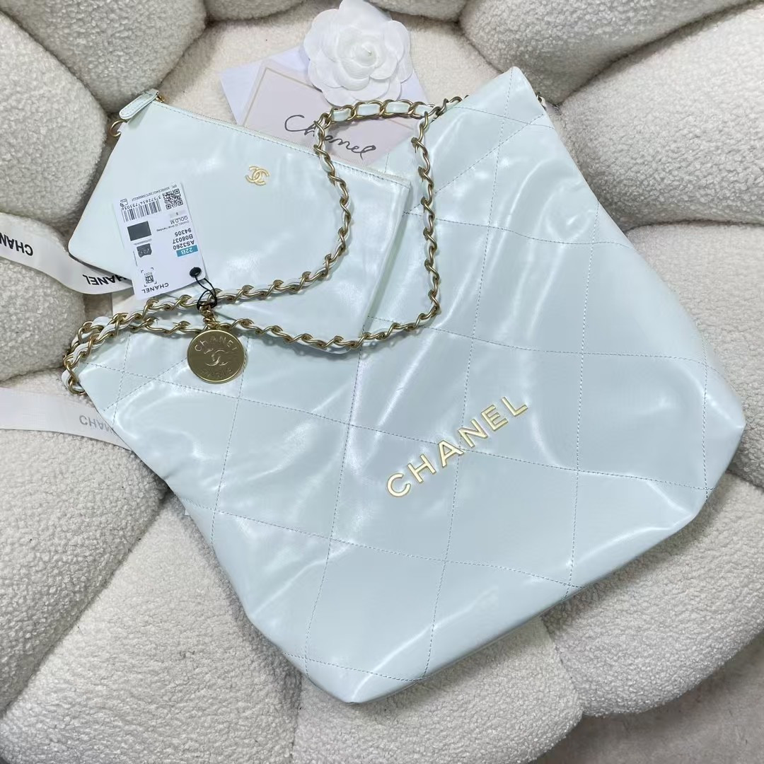 CHANEL 22 SMALL HANDBAG Shiny Calfskin Light Blue 37X35X7cm