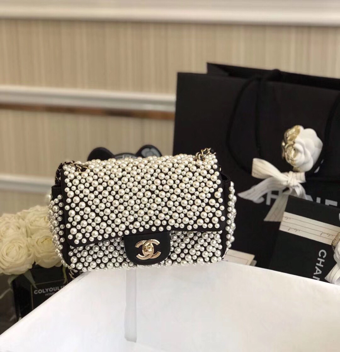 Chanel pearl on flap bag 5.9