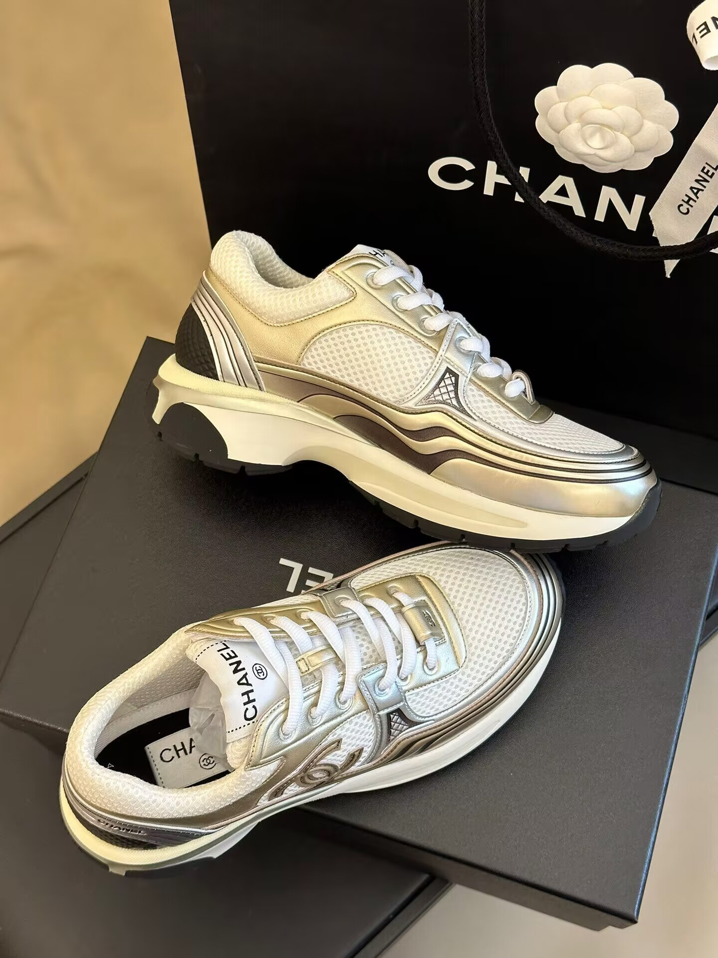 Chanel CC Runner Gold Laminate
