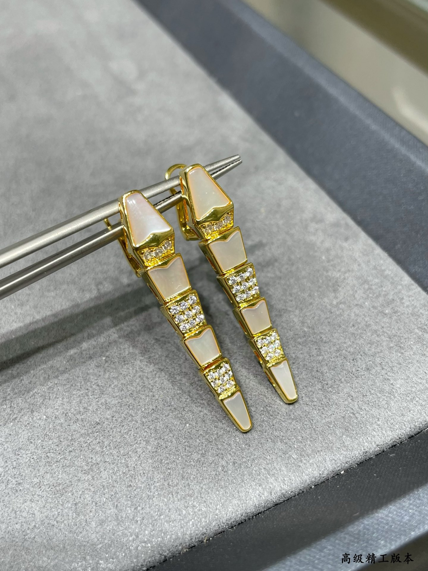 Bvlgari Advanced Mechanical Shell Snake Earrings