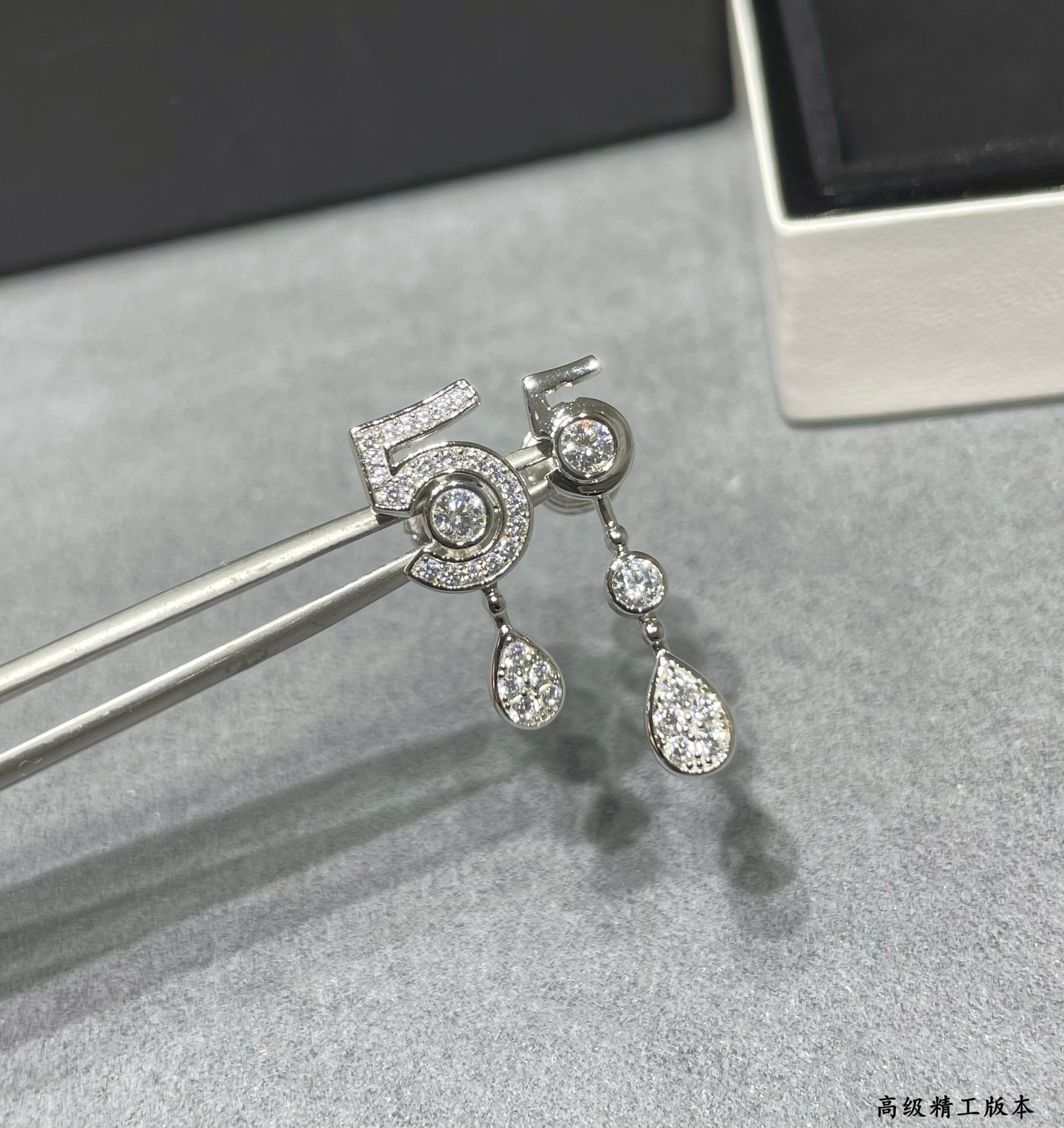 Chanel 5-word Earrings