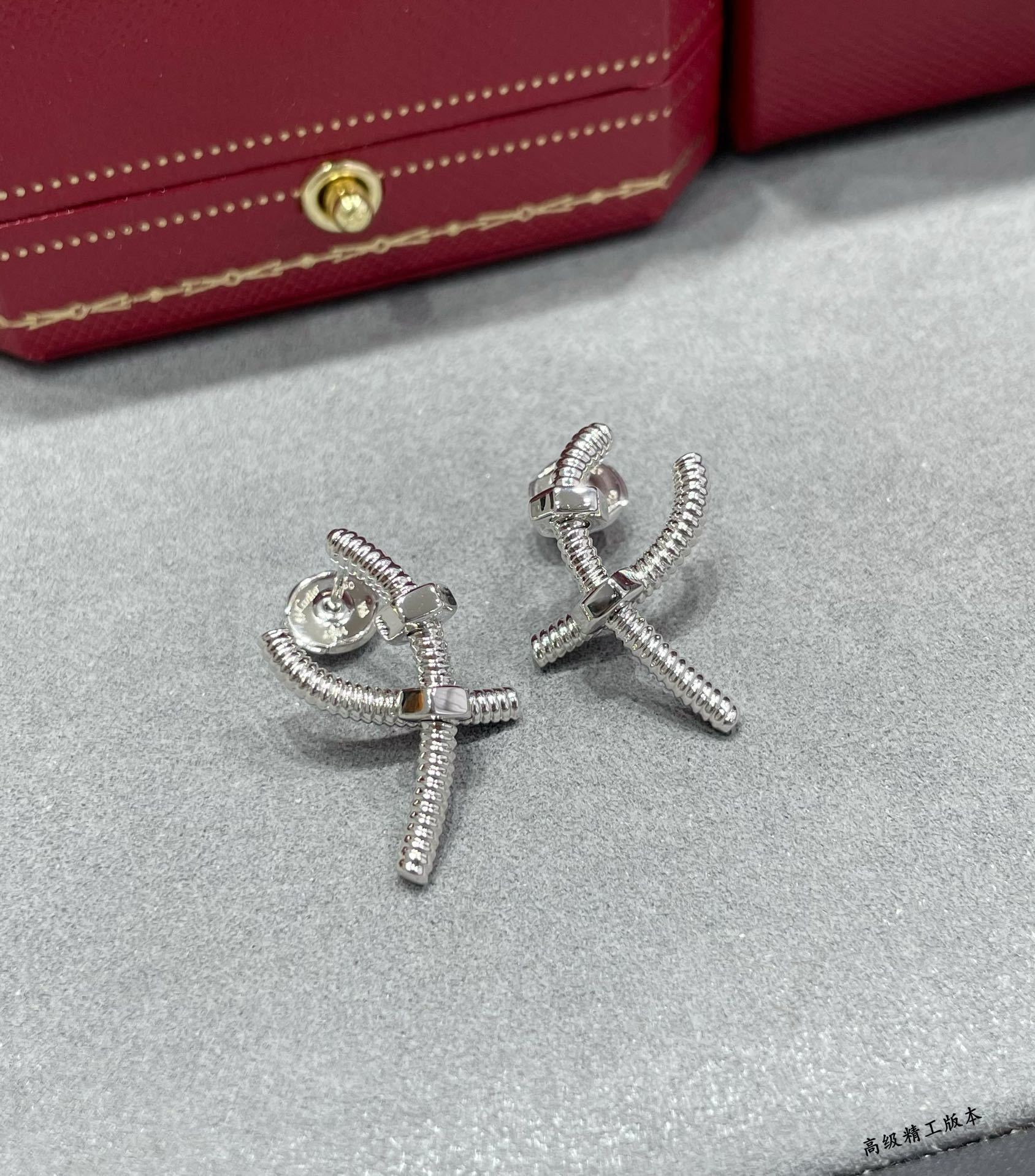 Cartier Cross Screw Earrings