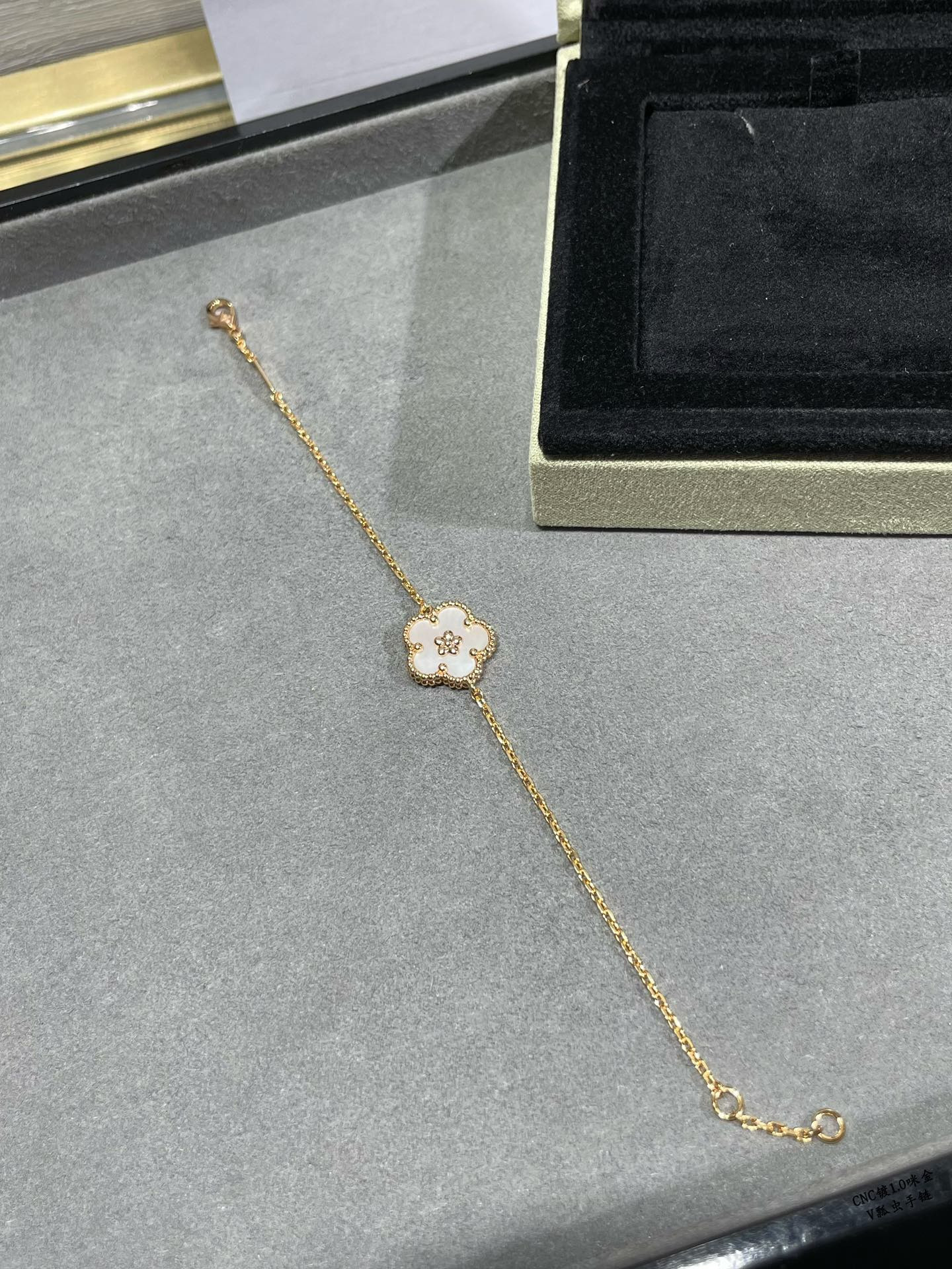 Van Cleef & Arpels plum blossom bracelet