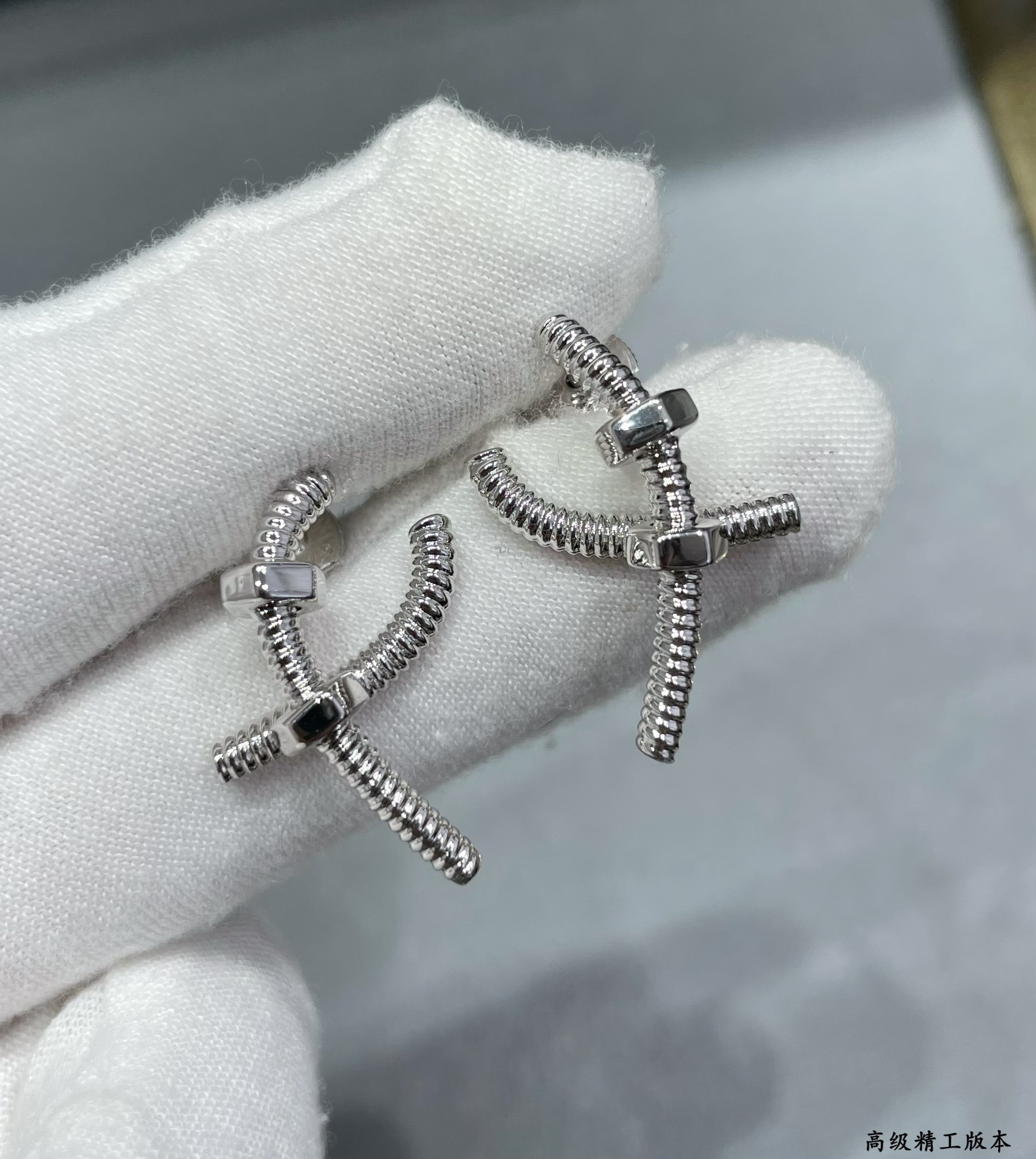 Cartier Cross Screw Earrings