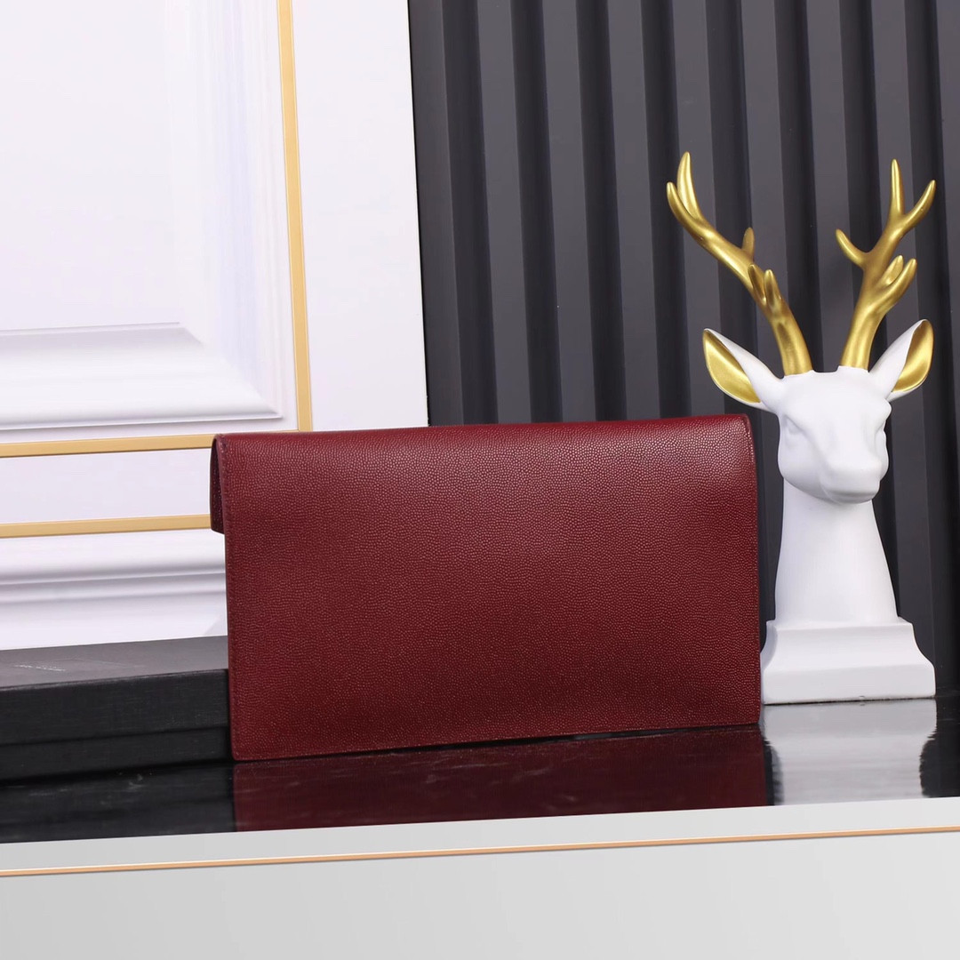 YSL UPTOWN POUCH IN GRAIN DE POUDRE EMBOSSED LEATHER ROUGE OPYUM 10.6 X 6.2 X 0.7 INCHES