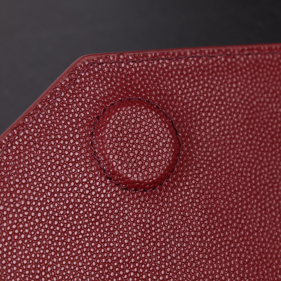 YSL UPTOWN POUCH IN GRAIN DE POUDRE EMBOSSED LEATHER ROUGE OPYUM 10.6 X 6.2 X 0.7 INCHES