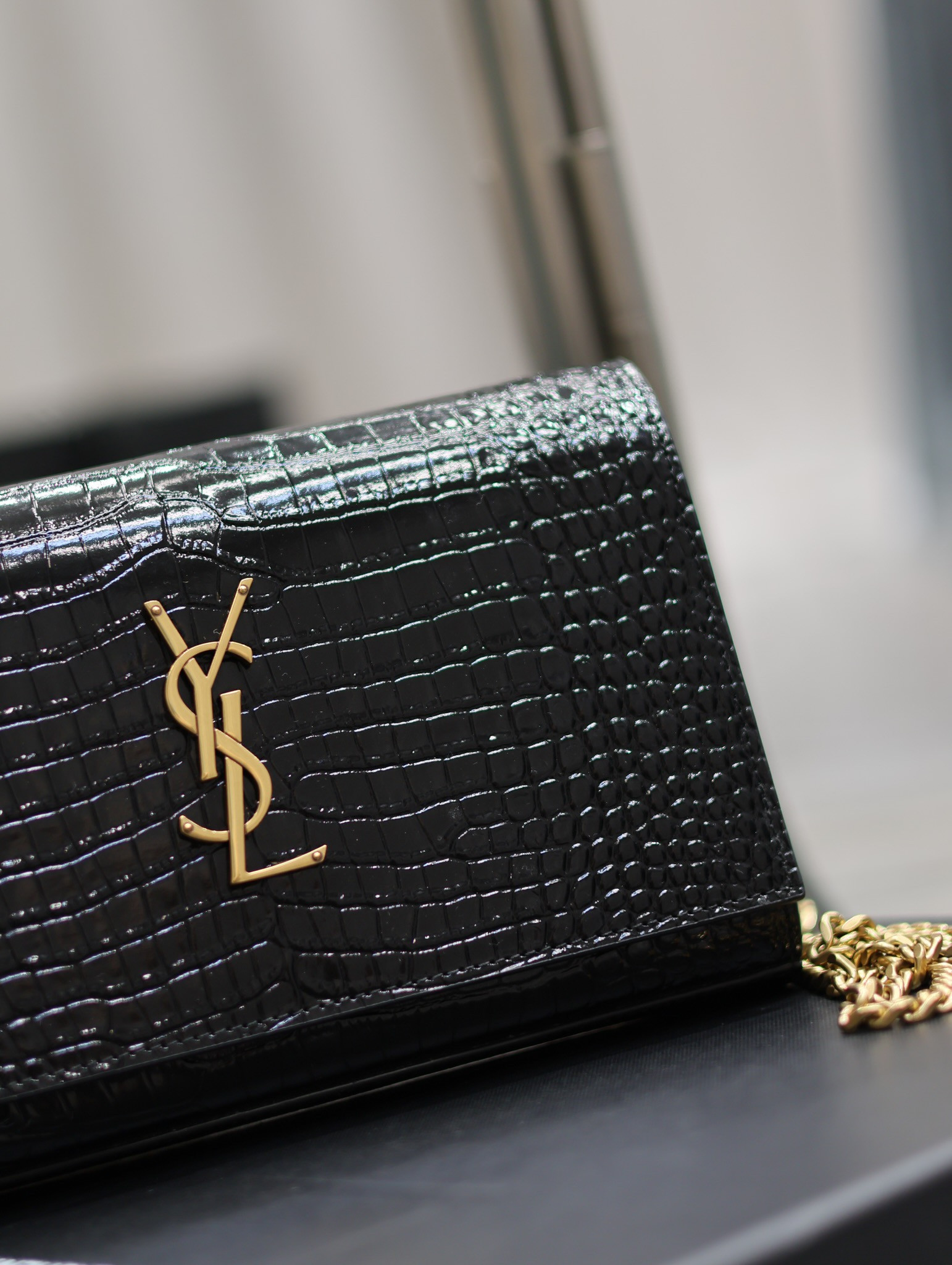 YSL CASSANDRE CHAIN WALLET IN CROCODILE-EMBOSSED SHINY LEATHER