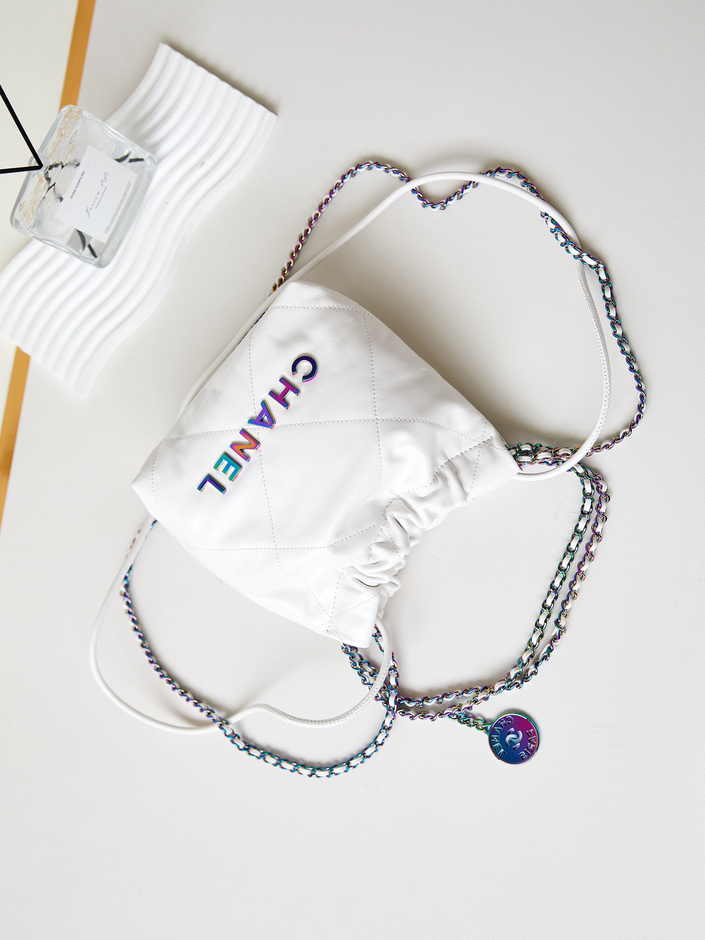 CHANEL 22 MINI HANDBAG Shiny Calfskin & Rainbow Metal White 7.8 × 7.4 × 2.3 in