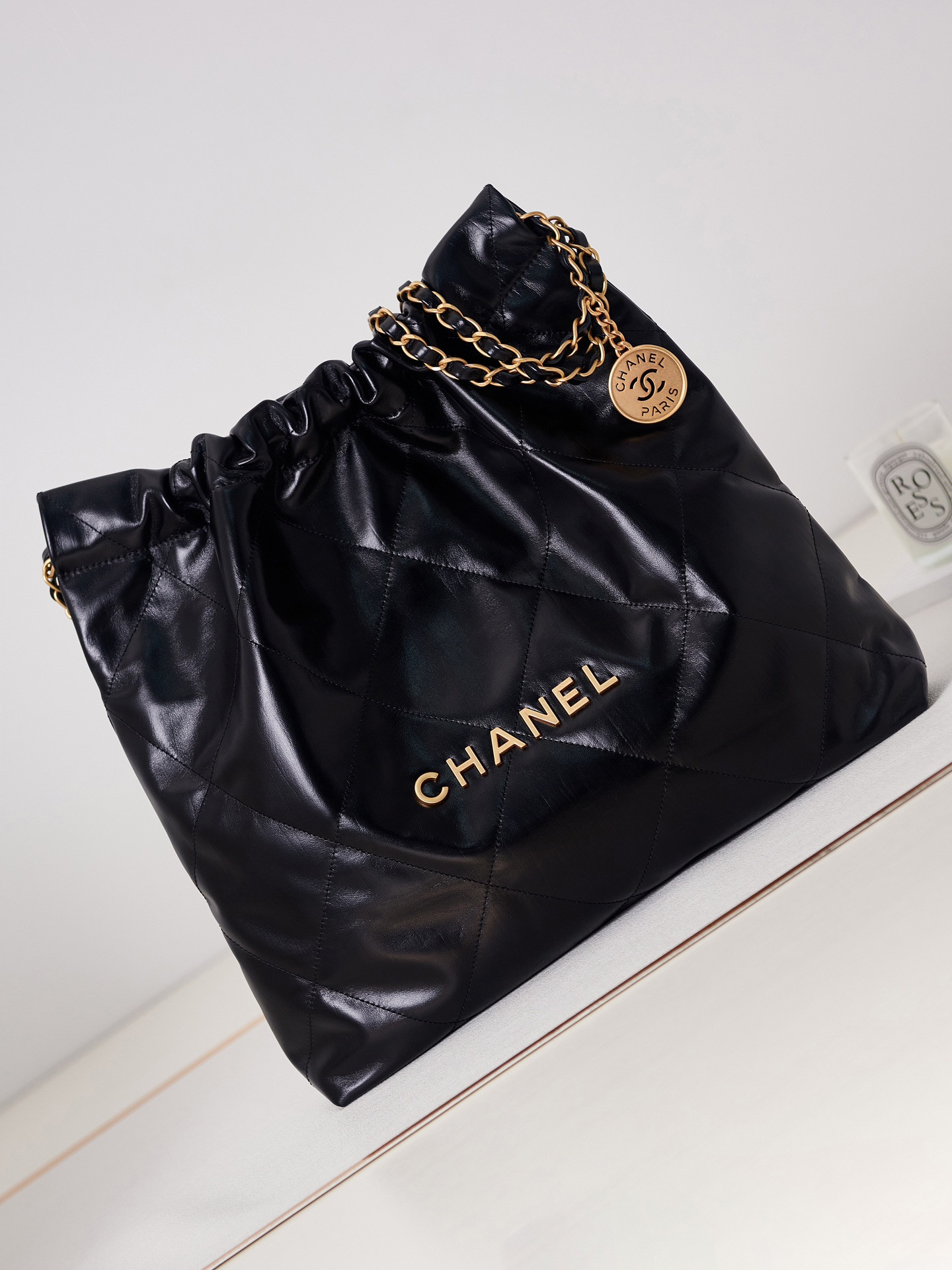 CHANEL 22 HANDBAG Shiny Calfskin & Gold-Tone Metal Black 15.2×16.4×3.1 in