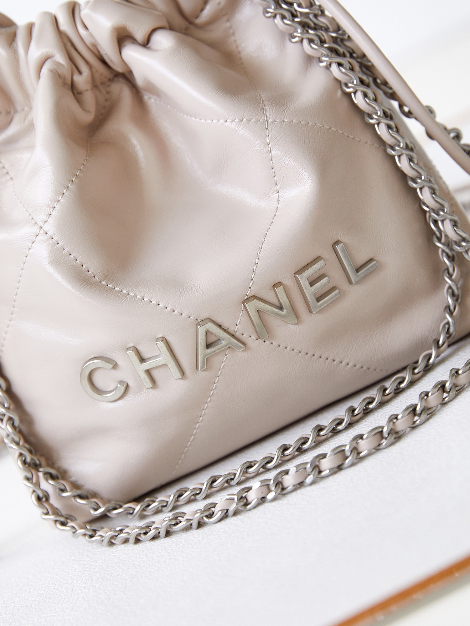 CHANEL 22 MINI HANDBAG Shiny Calfskin Apricot 7.8 × 7.4 × 2.3 in