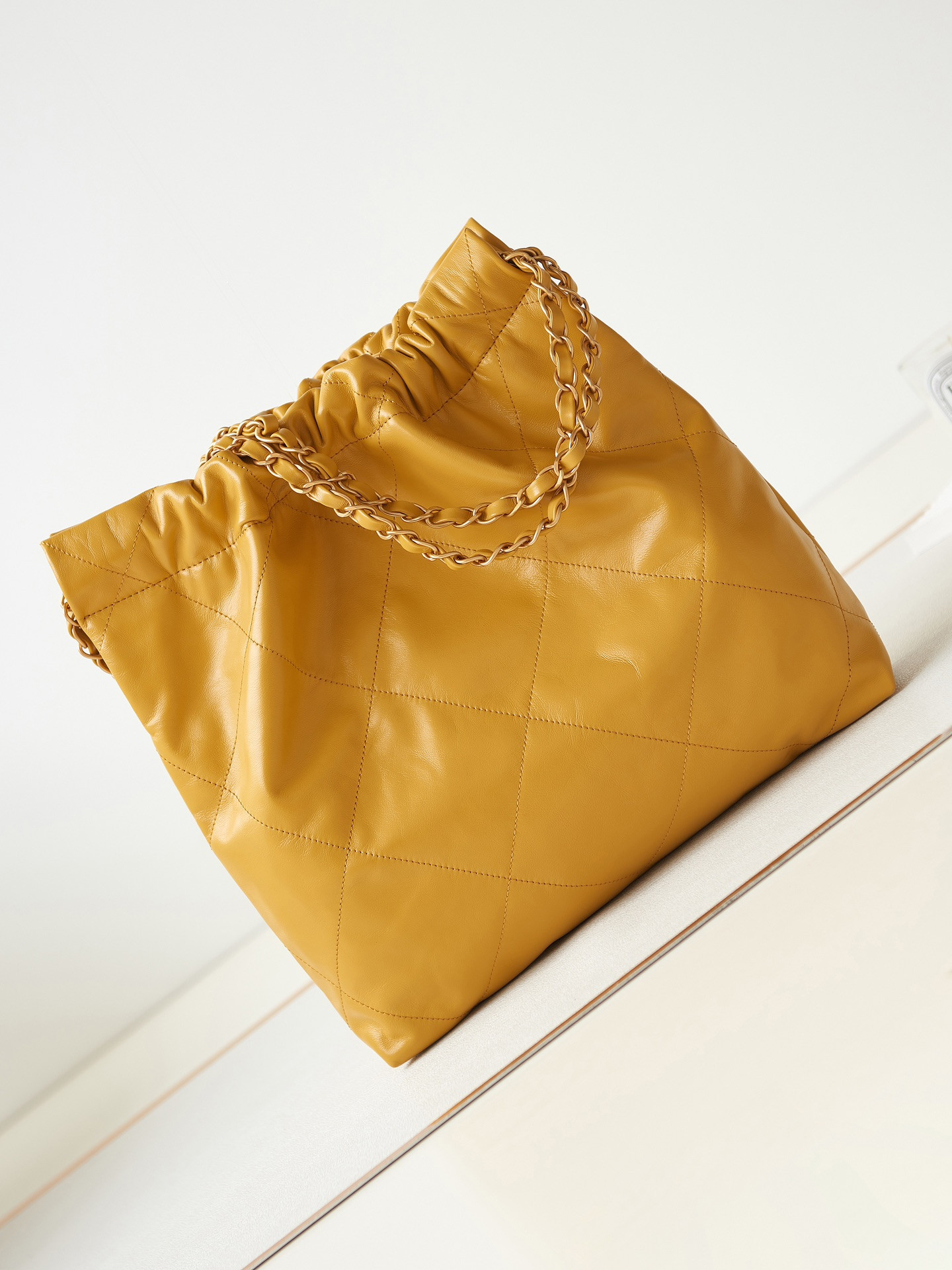 CHANEL 22 SMALL HANDBAG Shiny Calfskin YELLOW 13.7×14.4×2.7 in