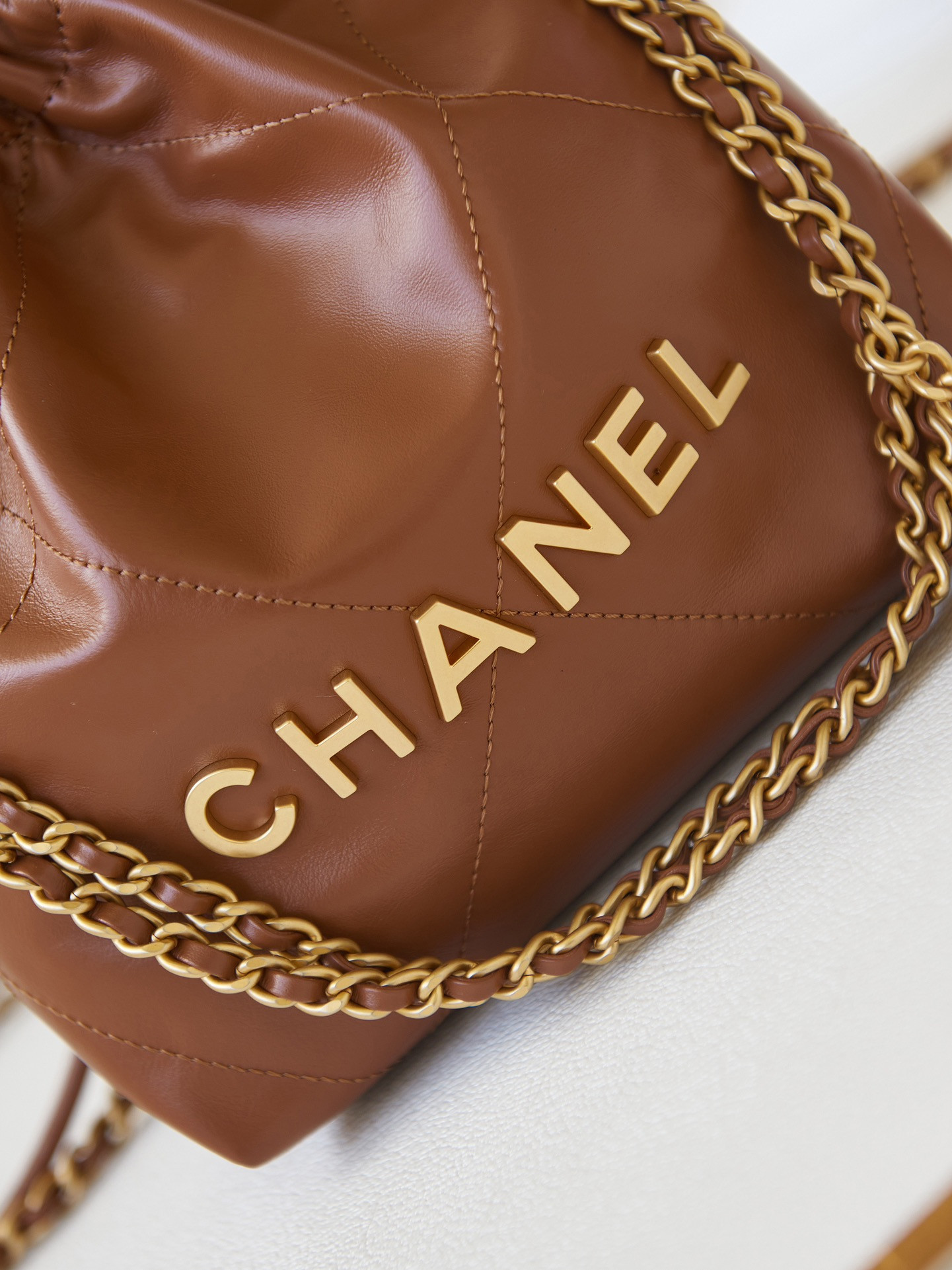 CHANEL 22 MINI HANDBAG Shiny Calfskin Brown 7.8 × 7.4 × 2.3 in