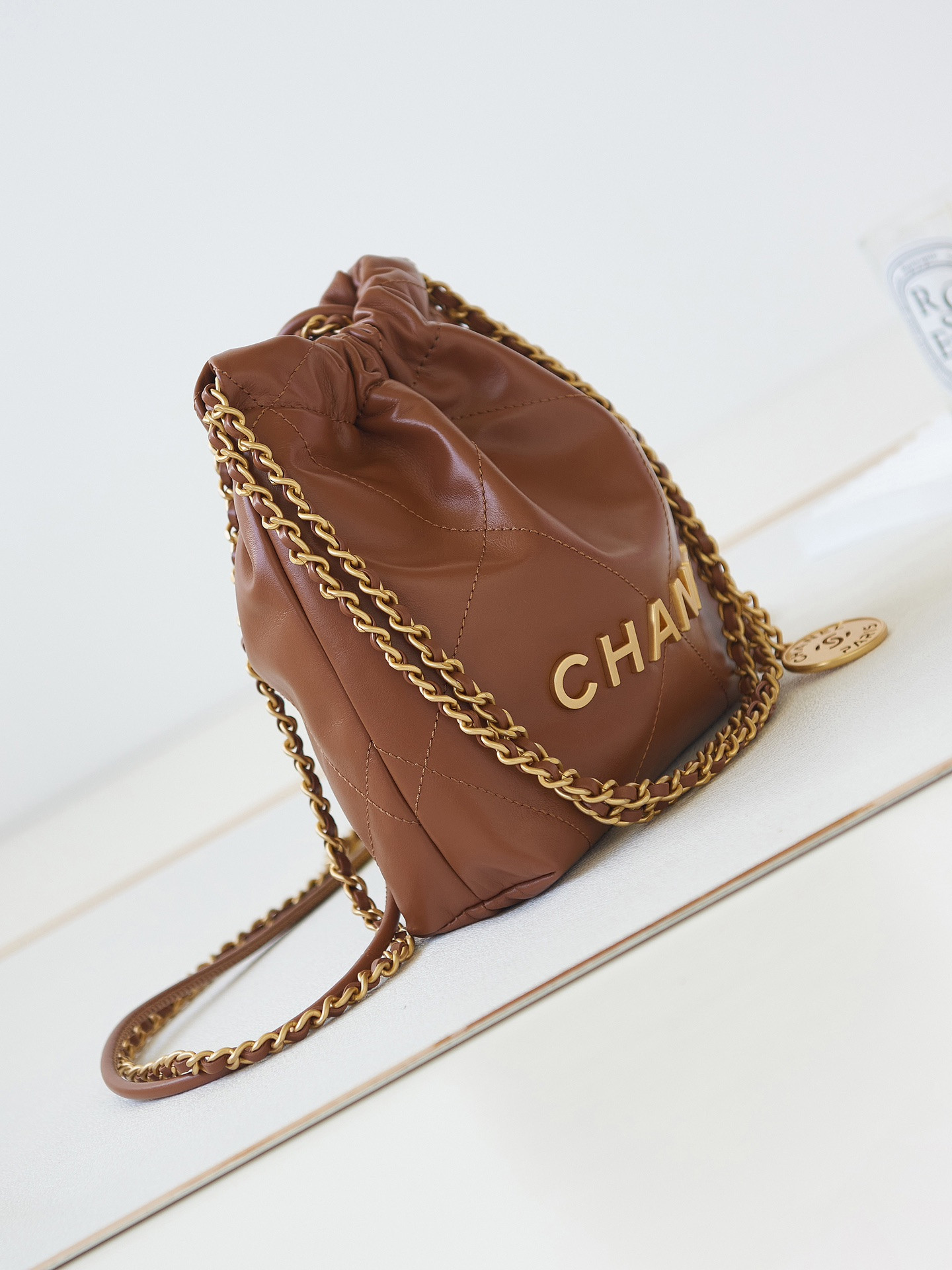 CHANEL 22 MINI HANDBAG Shiny Calfskin Brown 7.8 × 7.4 × 2.3 in