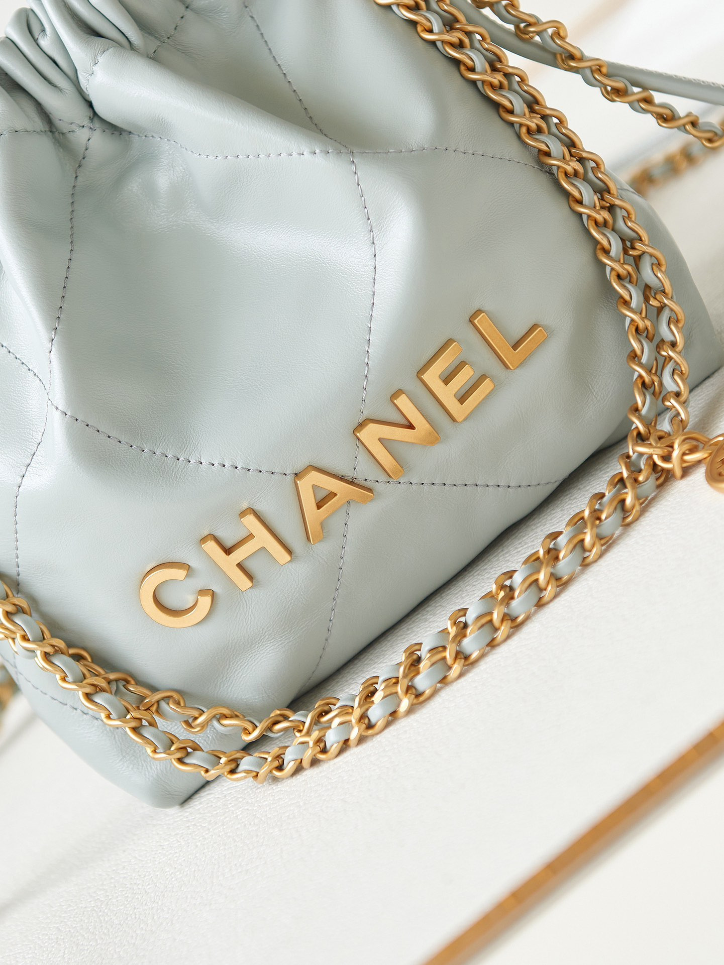 CHANEL 22 MINI HANDBAG Shiny Calfskin Light Blue 7.8 × 7.4 × 2.3 in