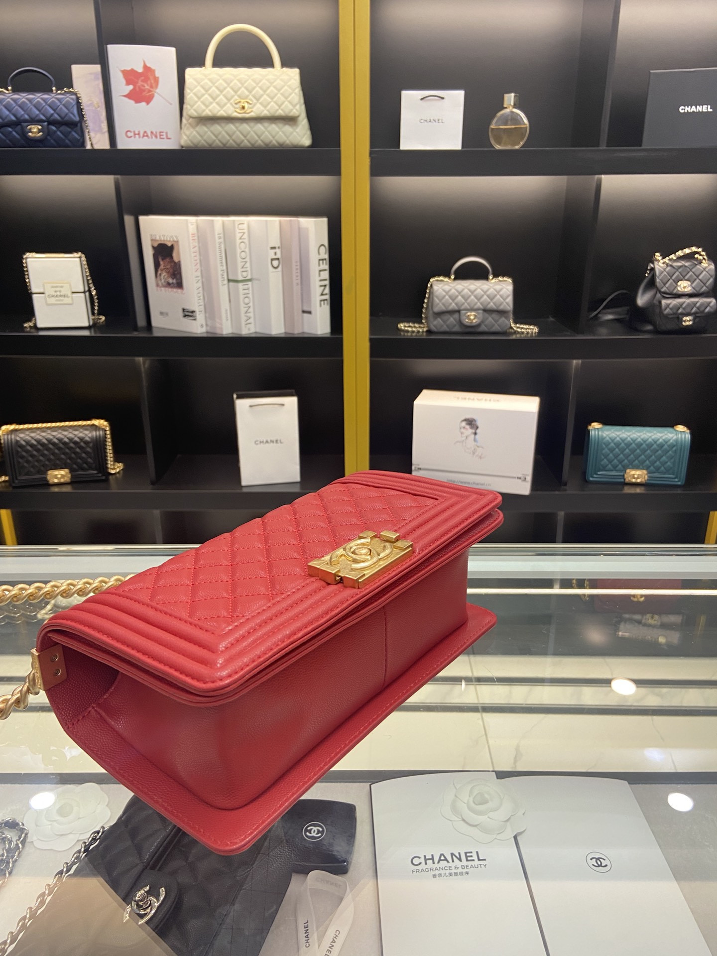 BOY CHANEL HANDBAG Shiny Red Grained Calfskin & Gold-Tone Metal 5.9 × 9.8 × 3.5 in