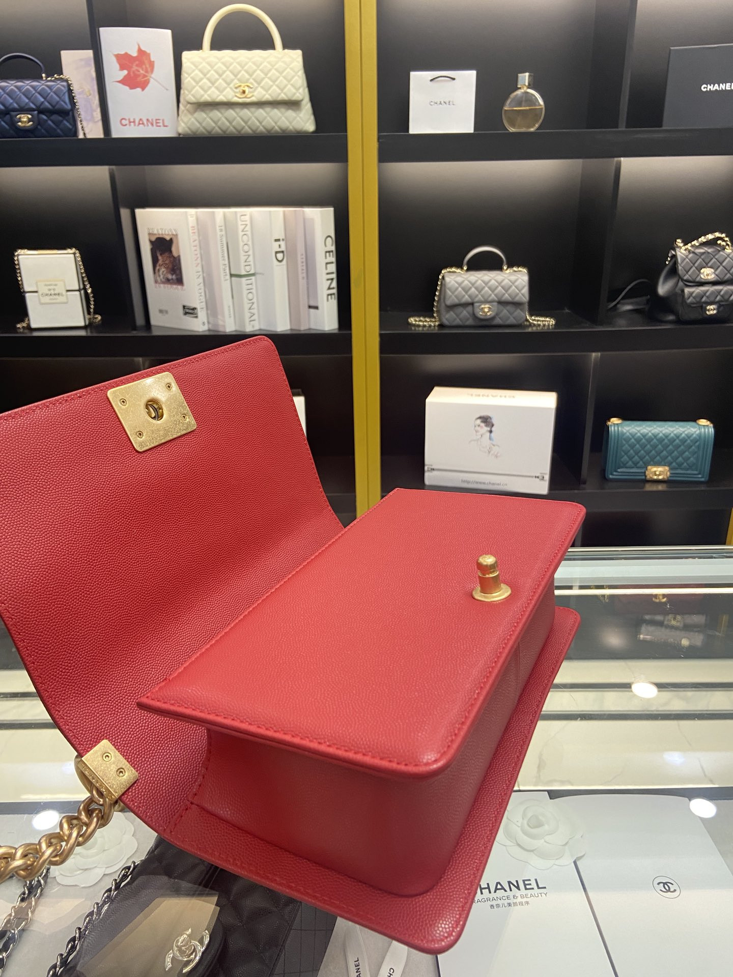 BOY CHANEL HANDBAG Shiny Red Grained Calfskin & Gold-Tone Metal 5.9 × 9.8 × 3.5 in