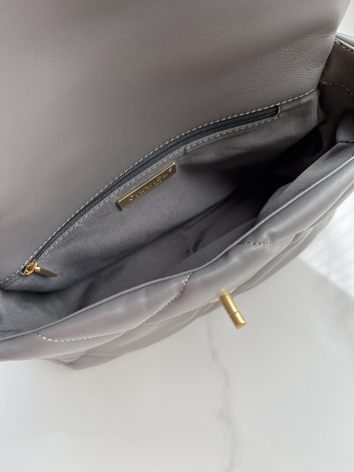 CHANEL 19 HANDBAG Shiny Leather, Gold-Tone, Silver-Tone & Ruthenium-Finish Metal Dark Gray 6.2 × 10.1 × 3.5 in