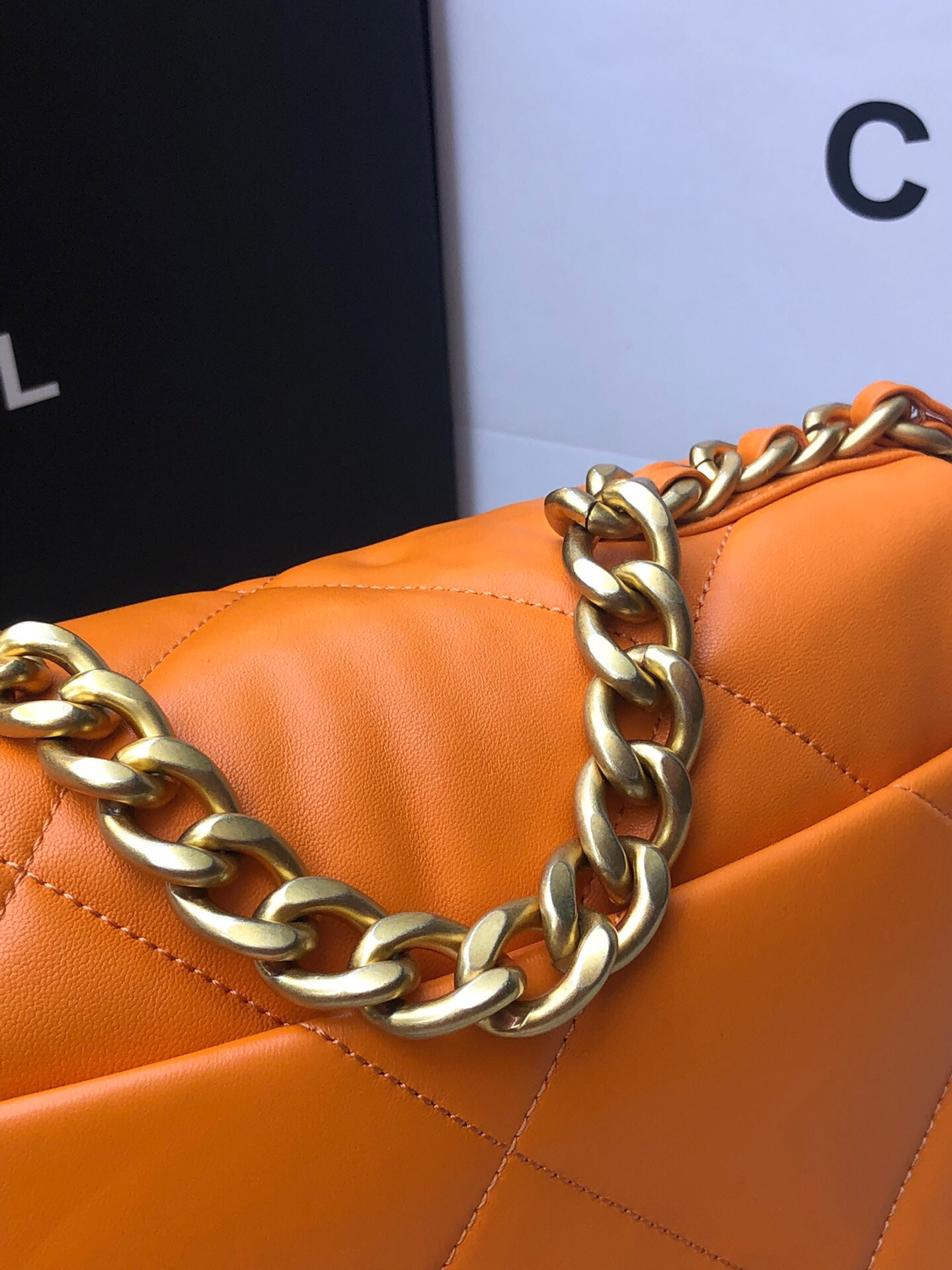 CHANEL 19 HANDBAG Shiny Leather, Gold-Tone, Silver-Tone & Ruthenium-Finish Metal Orange 6.2 × 10.1 × 3.5 in