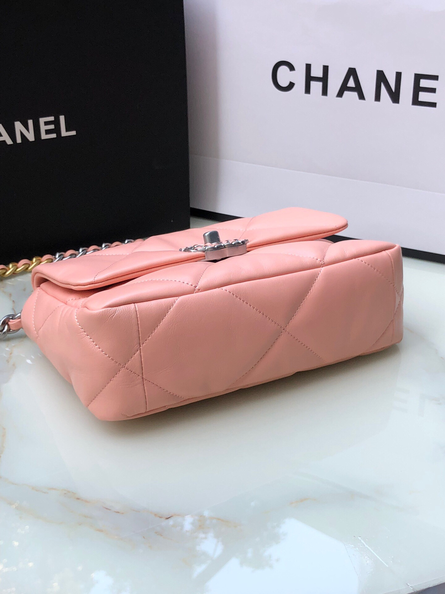 CHANEL 19 HANDBAG Shiny Leather, Gold-Tone, Silver-Tone & Ruthenium-Finish Metal Light Pink 6.2 × 10.1 × 3.5 in