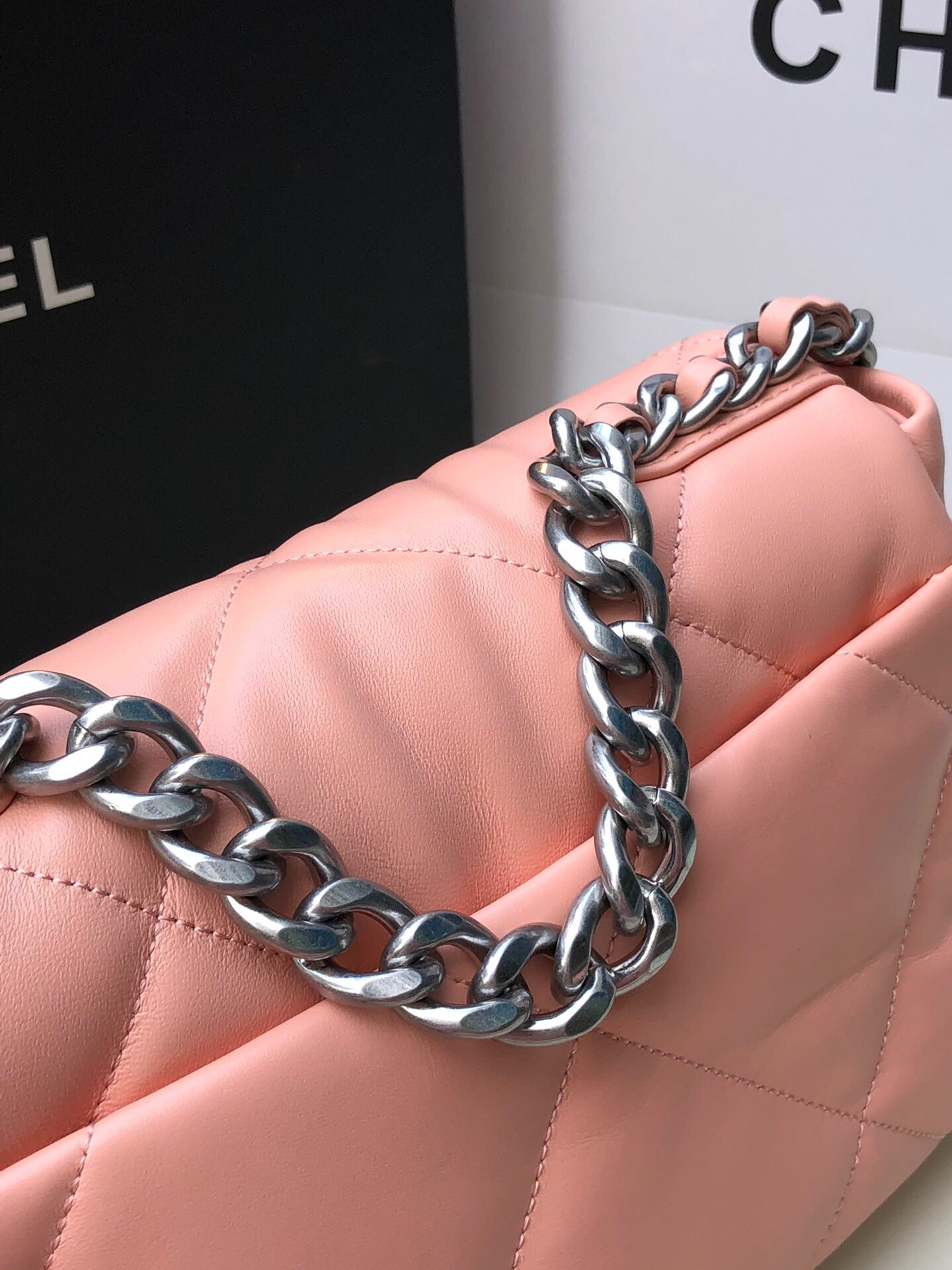 CHANEL 19 HANDBAG Shiny Leather, Gold-Tone, Silver-Tone & Ruthenium-Finish Metal Light Pink 6.2 × 10.1 × 3.5 in
