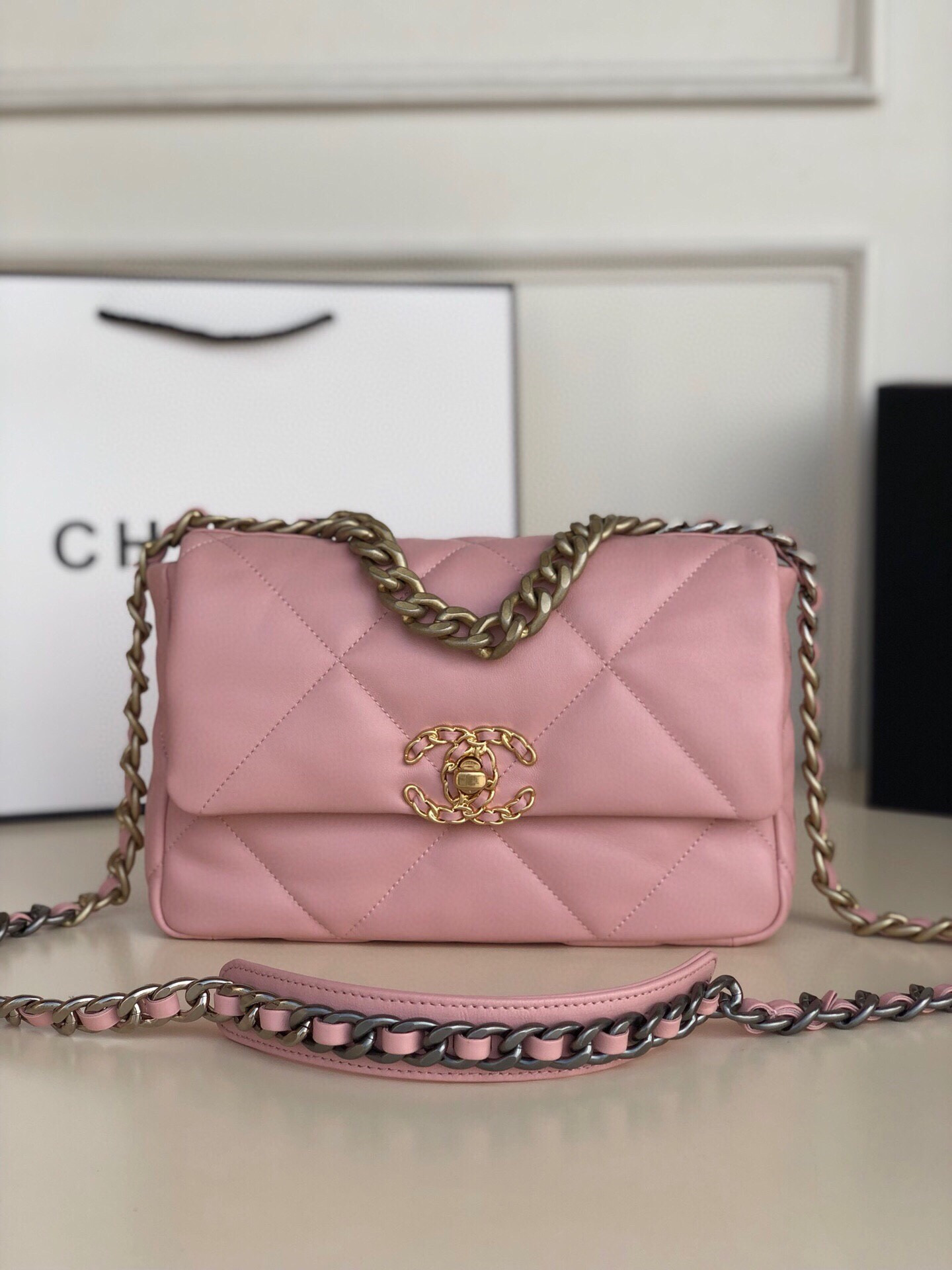 CHANEL 19 HANDBAG Shiny Leather, Gold-Tone, Silver-Tone & Ruthenium-Finish Metal Light Pink 6.2 × 10.1 × 3.5 in