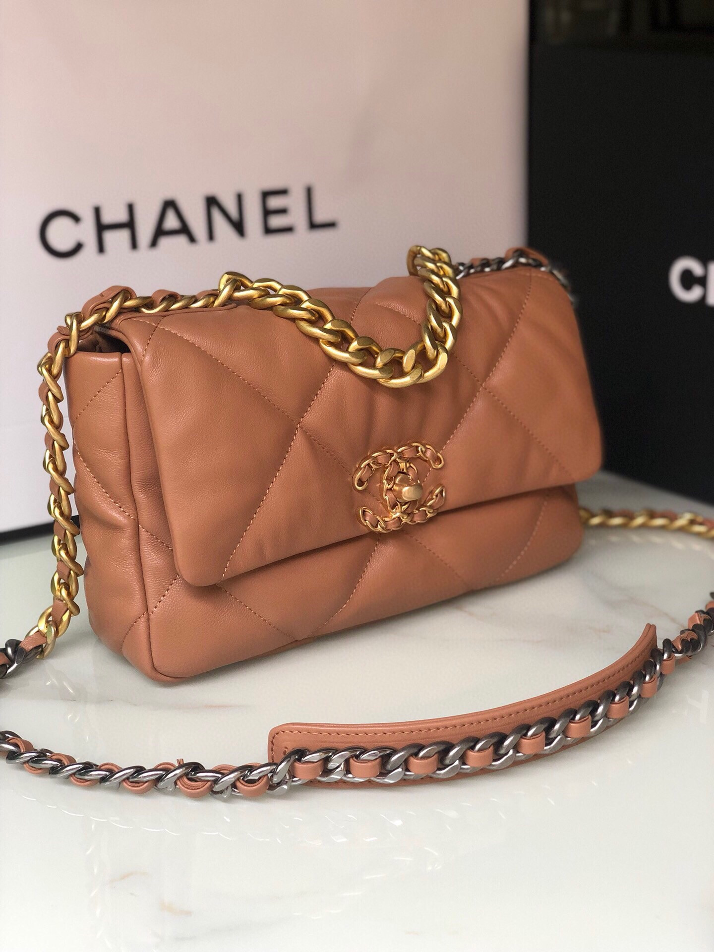 CHANEL 19 HANDBAG Shiny Leather, Gold-Tone, Silver-Tone & Ruthenium-Finish Metal Caramel 6.2 × 10.1 × 3.5 in