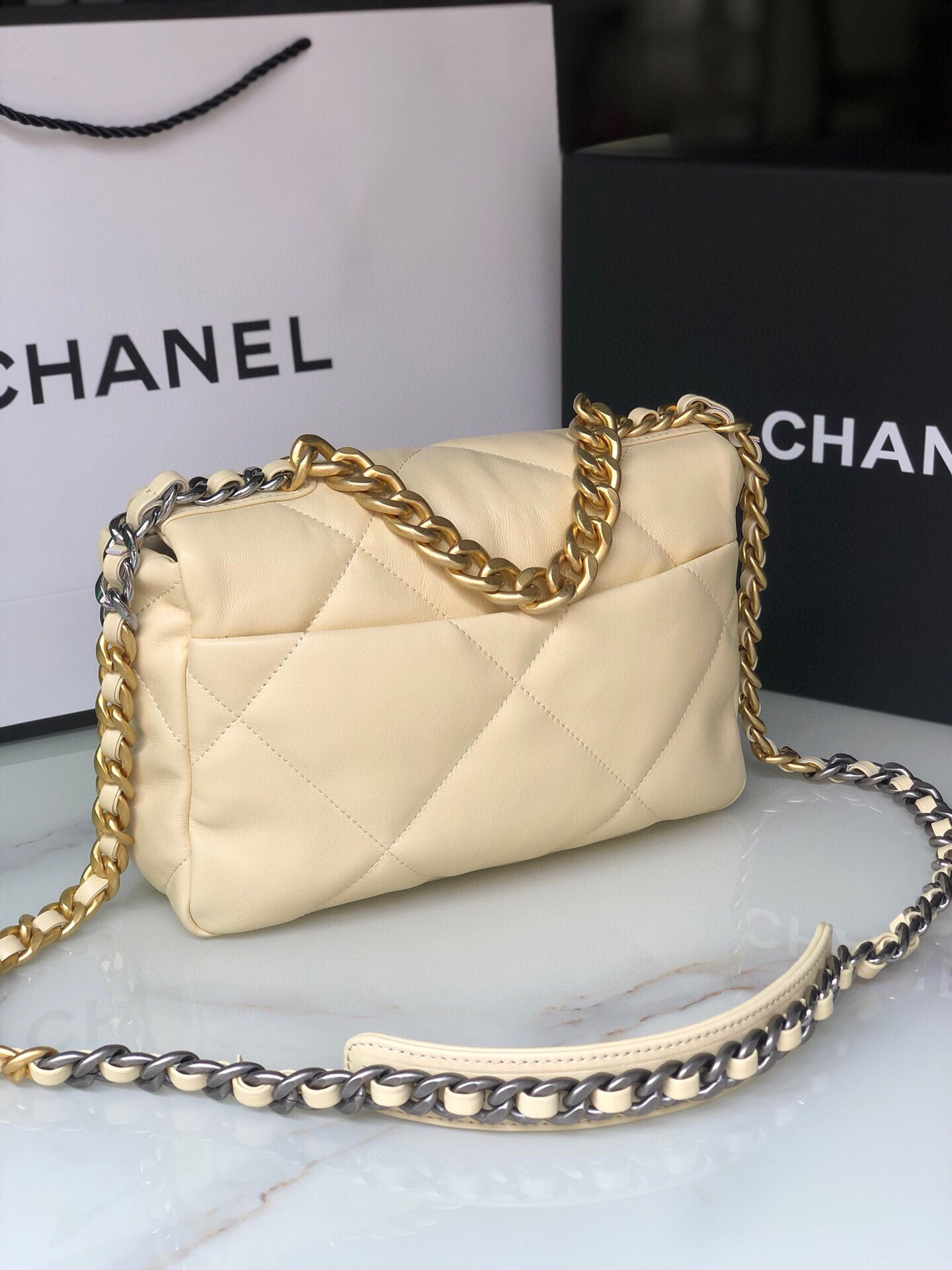 CHANEL 19 HANDBAG Shiny Leather, Gold-Tone, Silver-Tone & Ruthenium-Finish Metal Dark Yellow 6.2 × 10.1 × 3.5 in