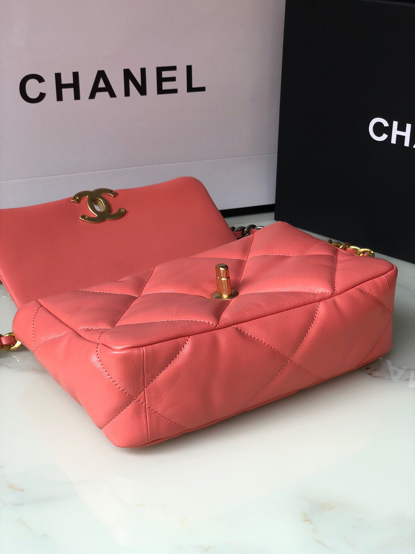 CHANEL 19 HANDBAG Shiny Pink Gold-Tone, Silver-Tone & Ruthenium-Finish Metal 6.2 × 10.1 × 3.5 in