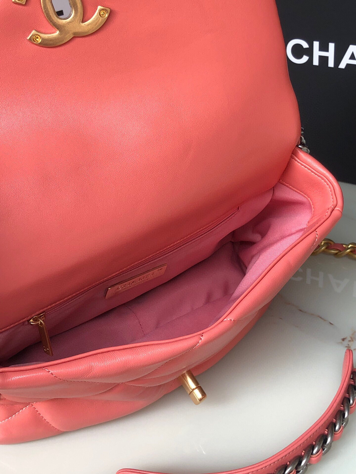 CHANEL 19 HANDBAG Shiny Pink Gold-Tone, Silver-Tone & Ruthenium-Finish Metal 6.2 × 10.1 × 3.5 in