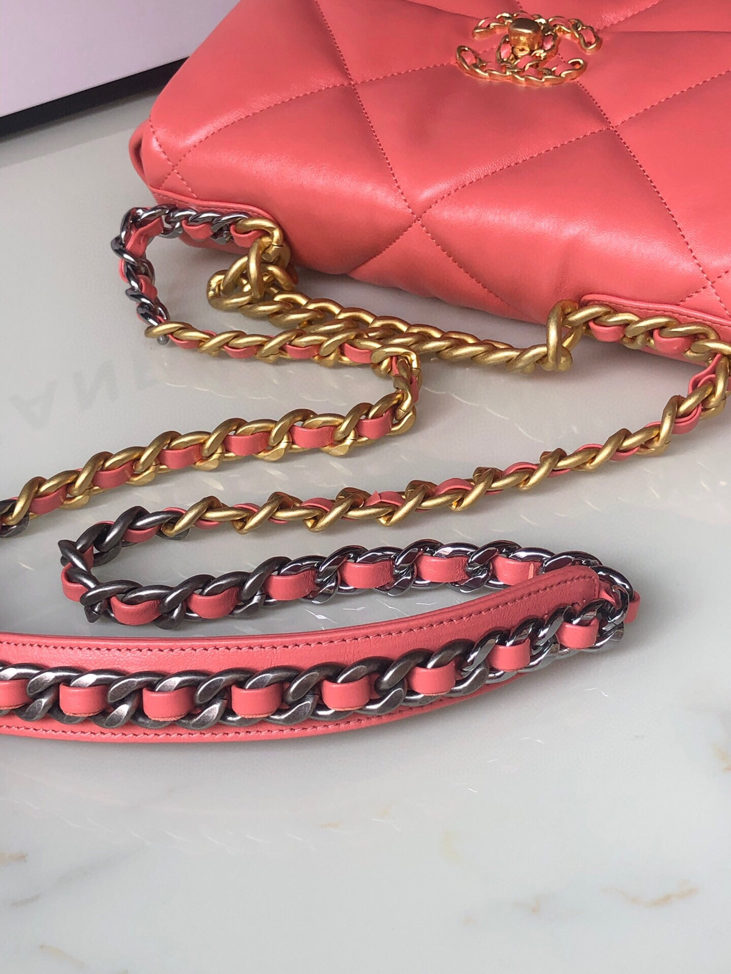 CHANEL 19 HANDBAG Shiny Pink Gold-Tone, Silver-Tone & Ruthenium-Finish Metal 6.2 × 10.1 × 3.5 in