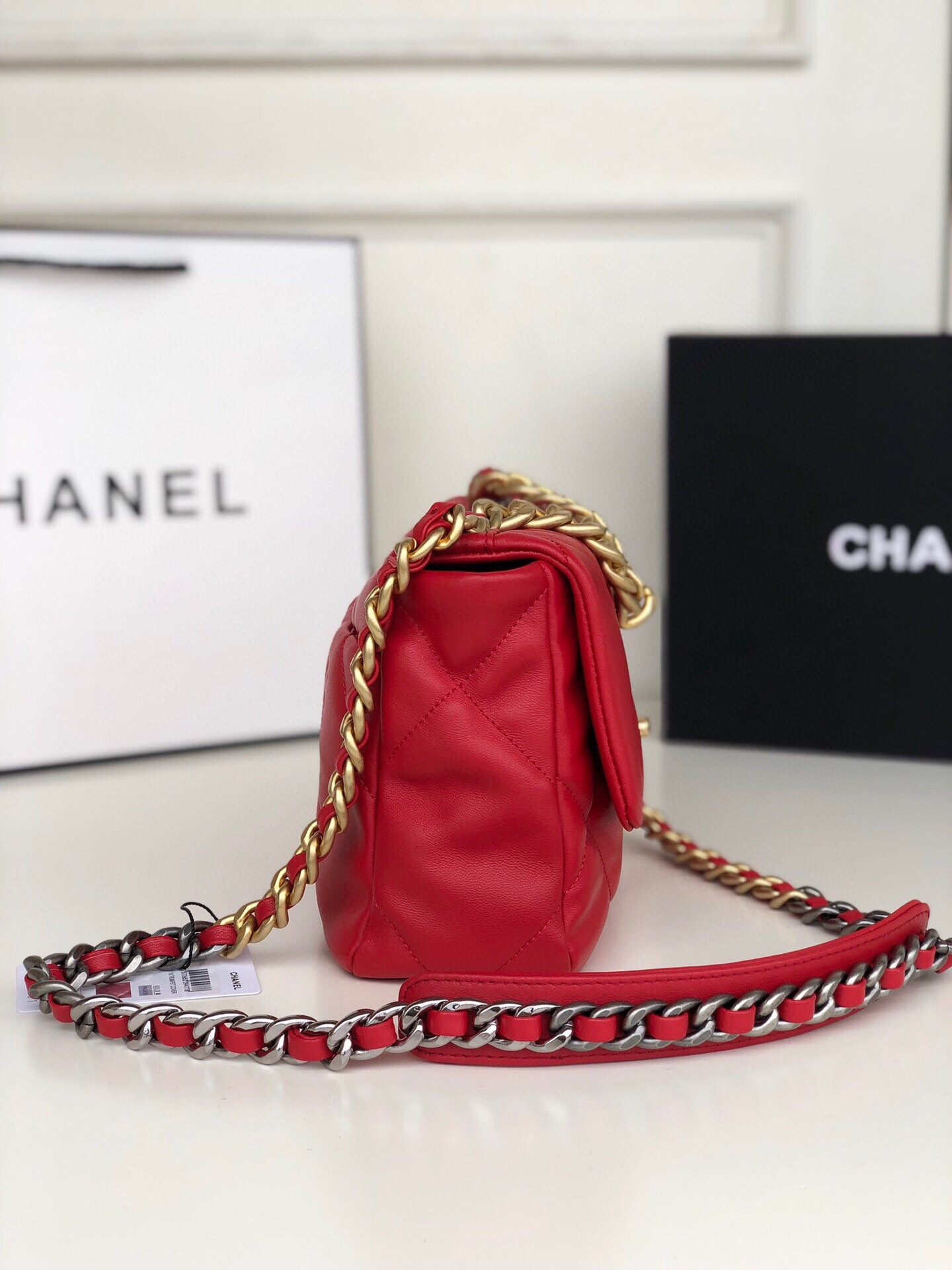 CHANEL 19 HANDBAG Shiny Leather, Gold-Tone, Silver-Tone & Ruthenium-Finish Metal Red 6.2 × 10.1 × 3.5 in
