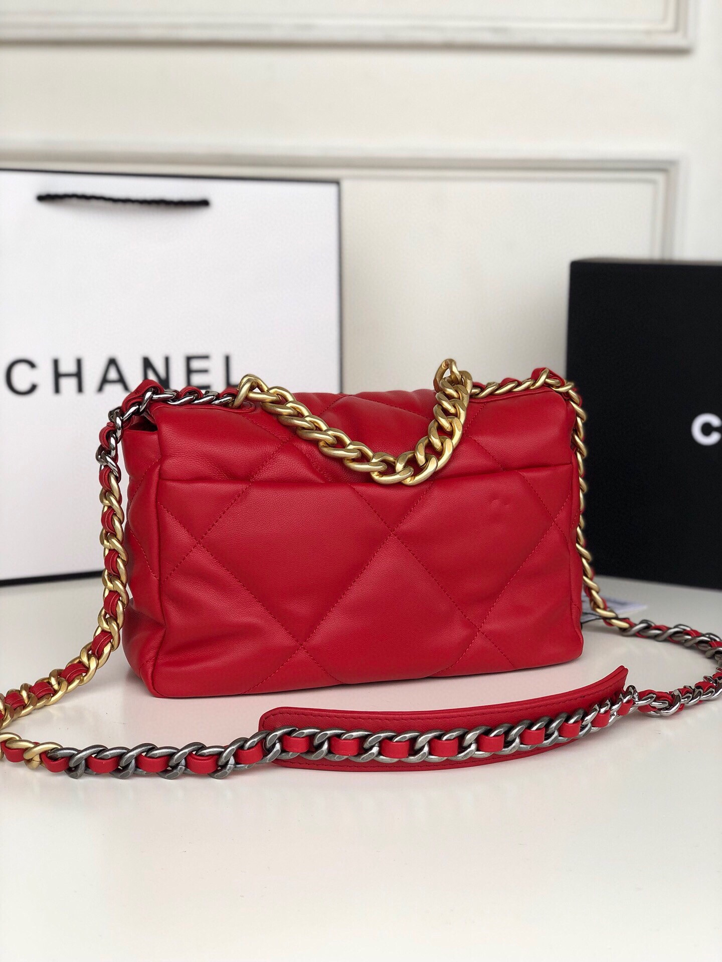 CHANEL 19 HANDBAG Shiny Leather, Gold-Tone, Silver-Tone & Ruthenium-Finish Metal Red 6.2 × 10.1 × 3.5 in