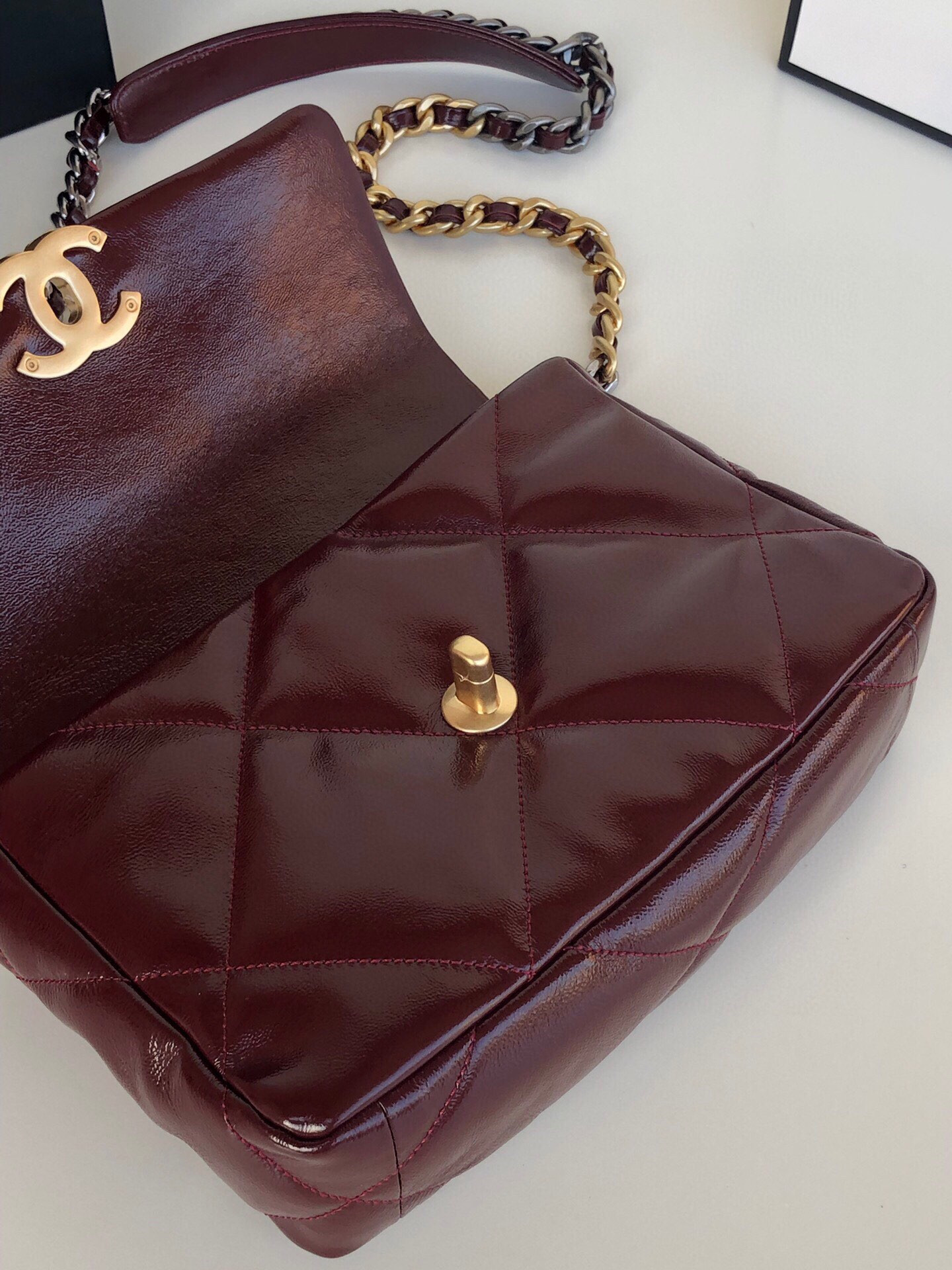 CHANEL 19 HANDBAG Shiny Leather, Gold-Tone, Silver-Tone & Ruthenium-Finish Metal Dark Red 6.2 × 10.1 × 3.5 in