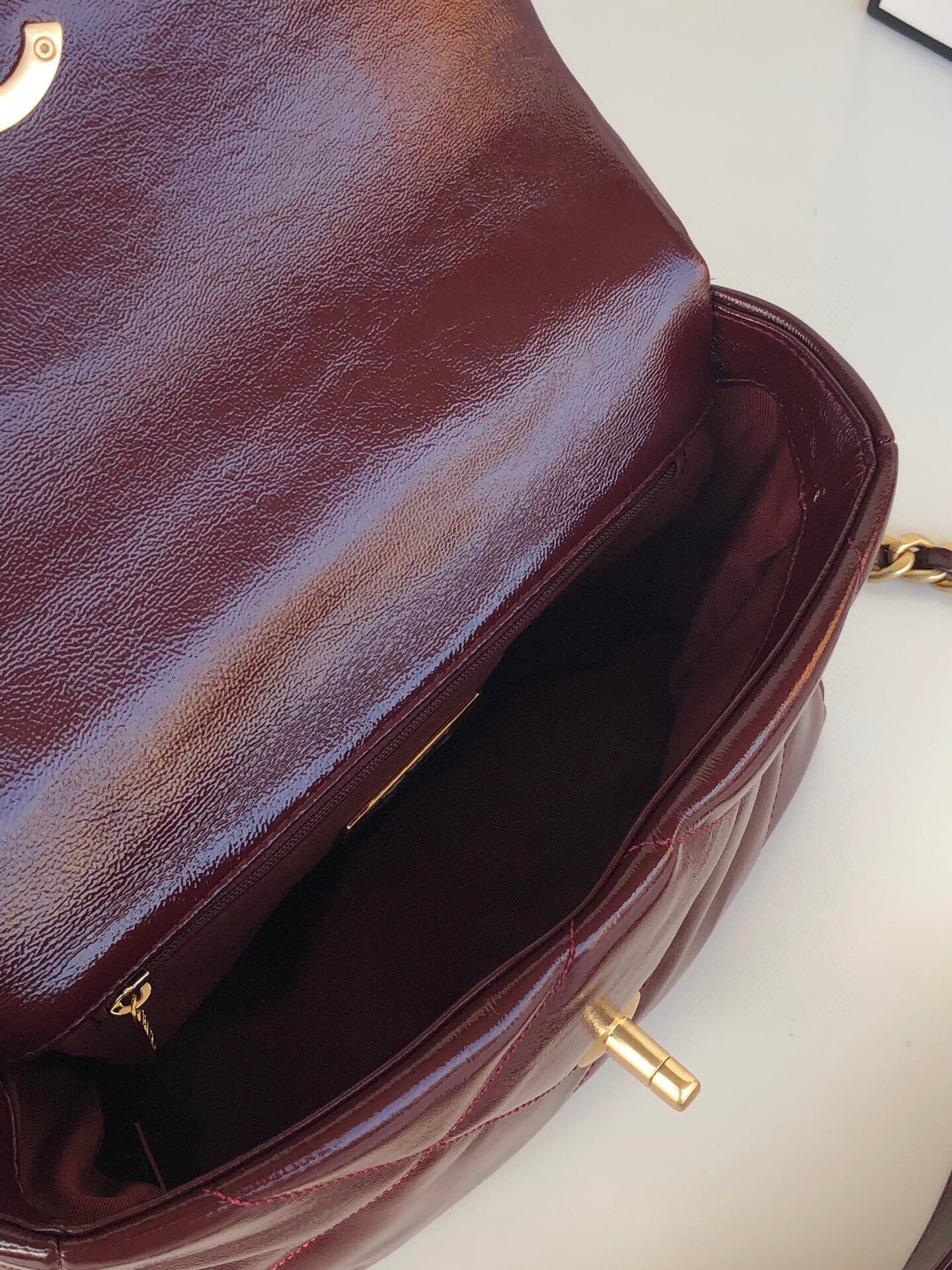 CHANEL 19 HANDBAG Shiny Leather, Gold-Tone, Silver-Tone & Ruthenium-Finish Metal Dark Red 6.2 × 10.1 × 3.5 in