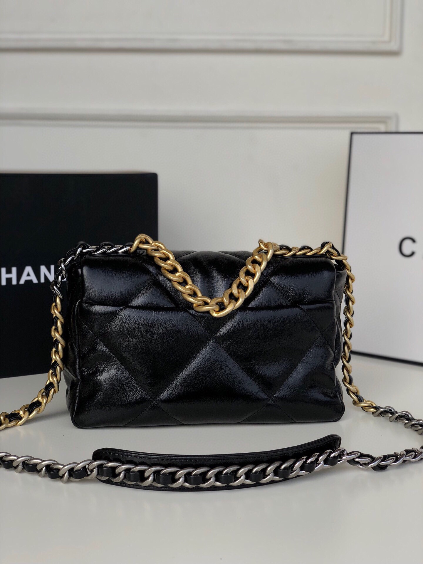 CHANEL 19 HANDBAG Shiny Leather, Gold-Tone, Silver-Tone & Ruthenium-Finish Metal Black 6.2 × 10.1 × 3.5 in