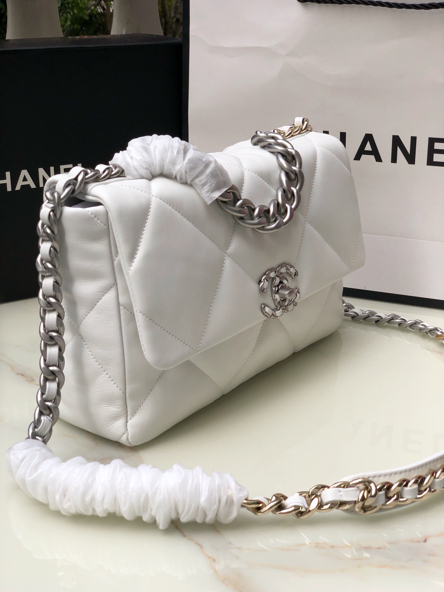 CHANEL 19 LARGE HANDBAG Shiny Leather, Gold-Tone, Silver-Tone & Ruthenium-Finish Metal White 7.8 × 11.7 × 3.9 in