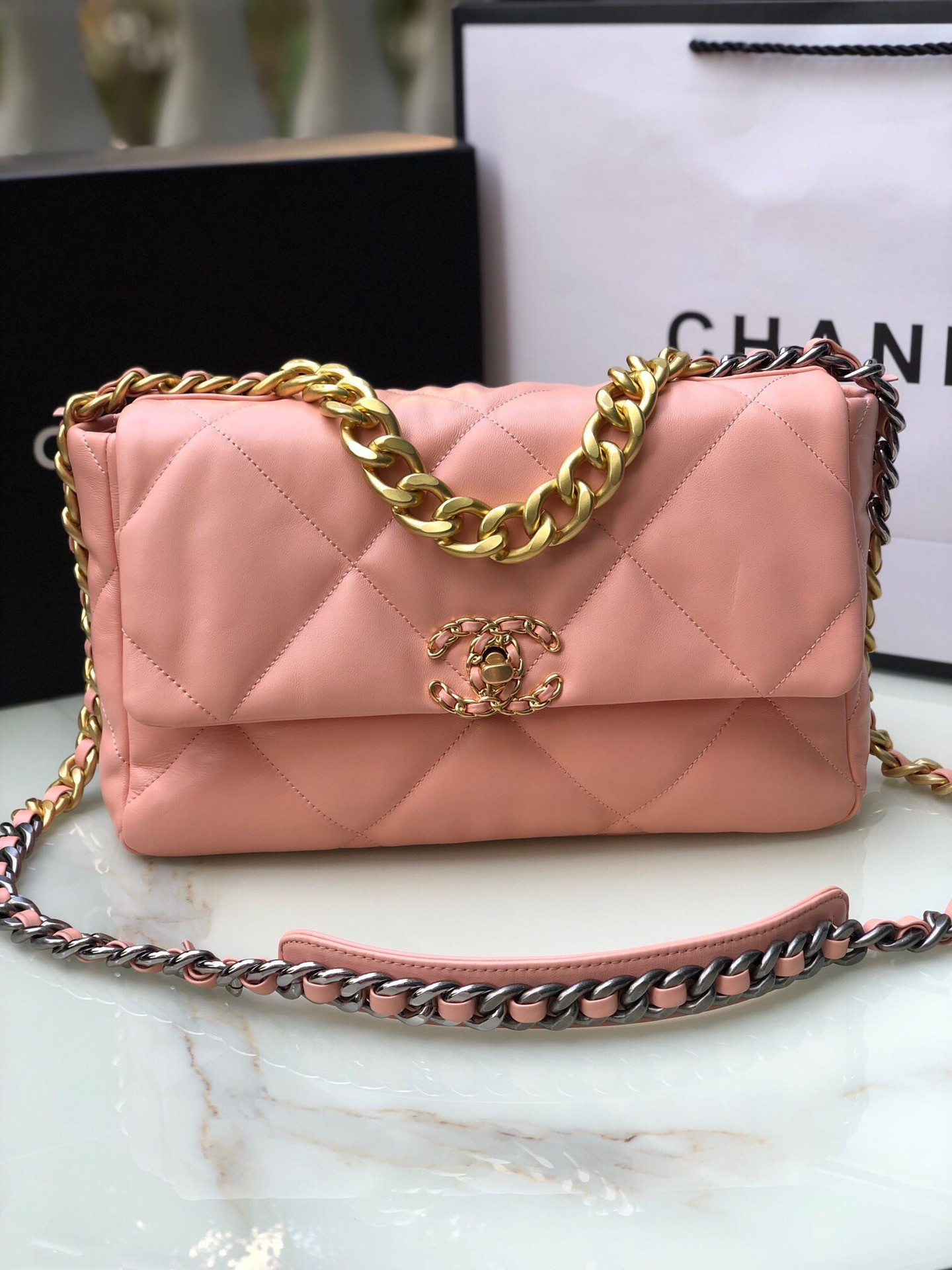 CHANEL 19 LARGE HANDBAG Shiny Leather, Gold-Tone, Silver-Tone & Ruthenium-Finish Metal Light Pink 7.8 × 11.7 × 3.9 in