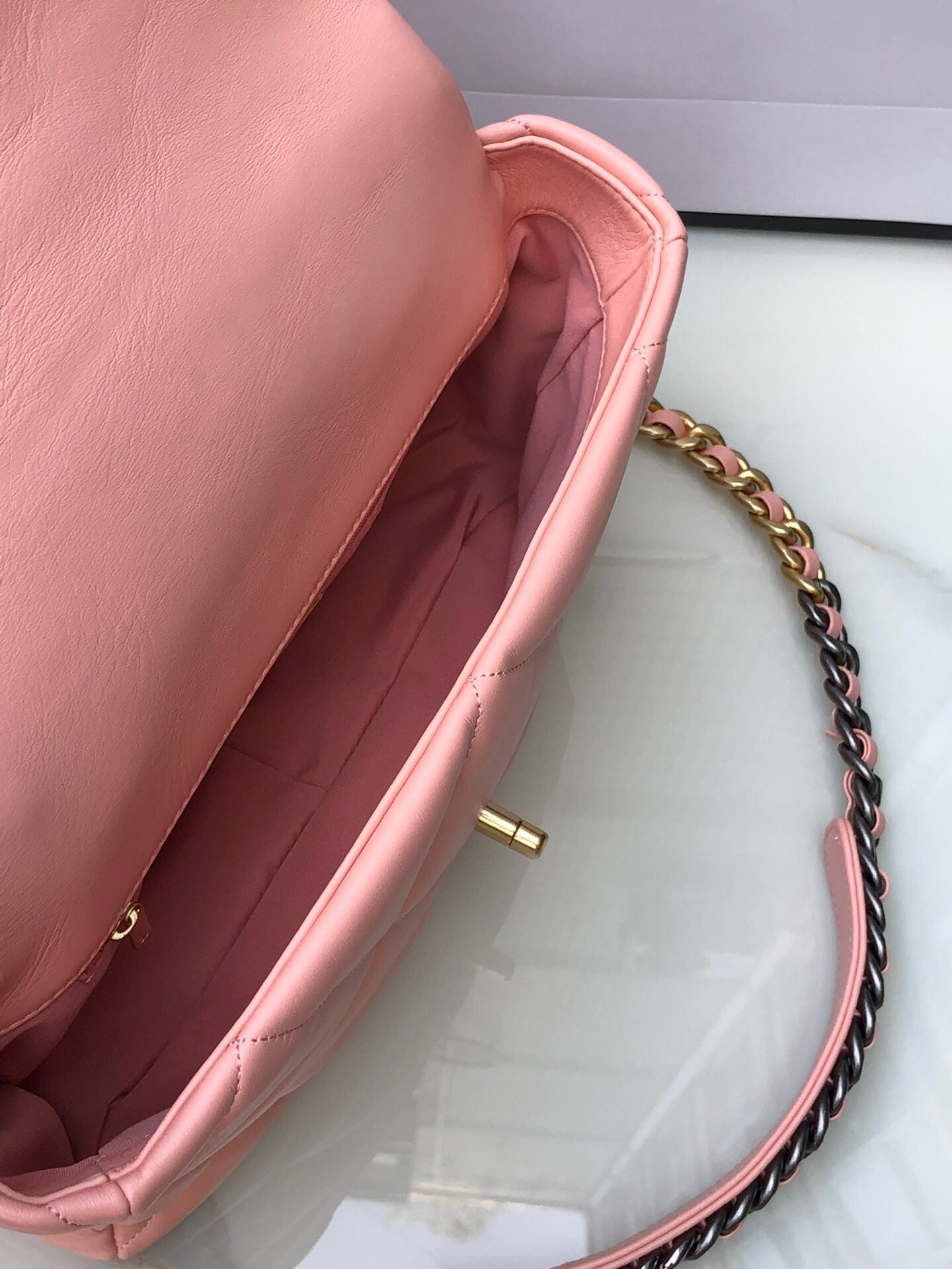 CHANEL 19 LARGE HANDBAG Shiny Leather, Gold-Tone, Silver-Tone & Ruthenium-Finish Metal Light Pink 7.8 × 11.7 × 3.9 in