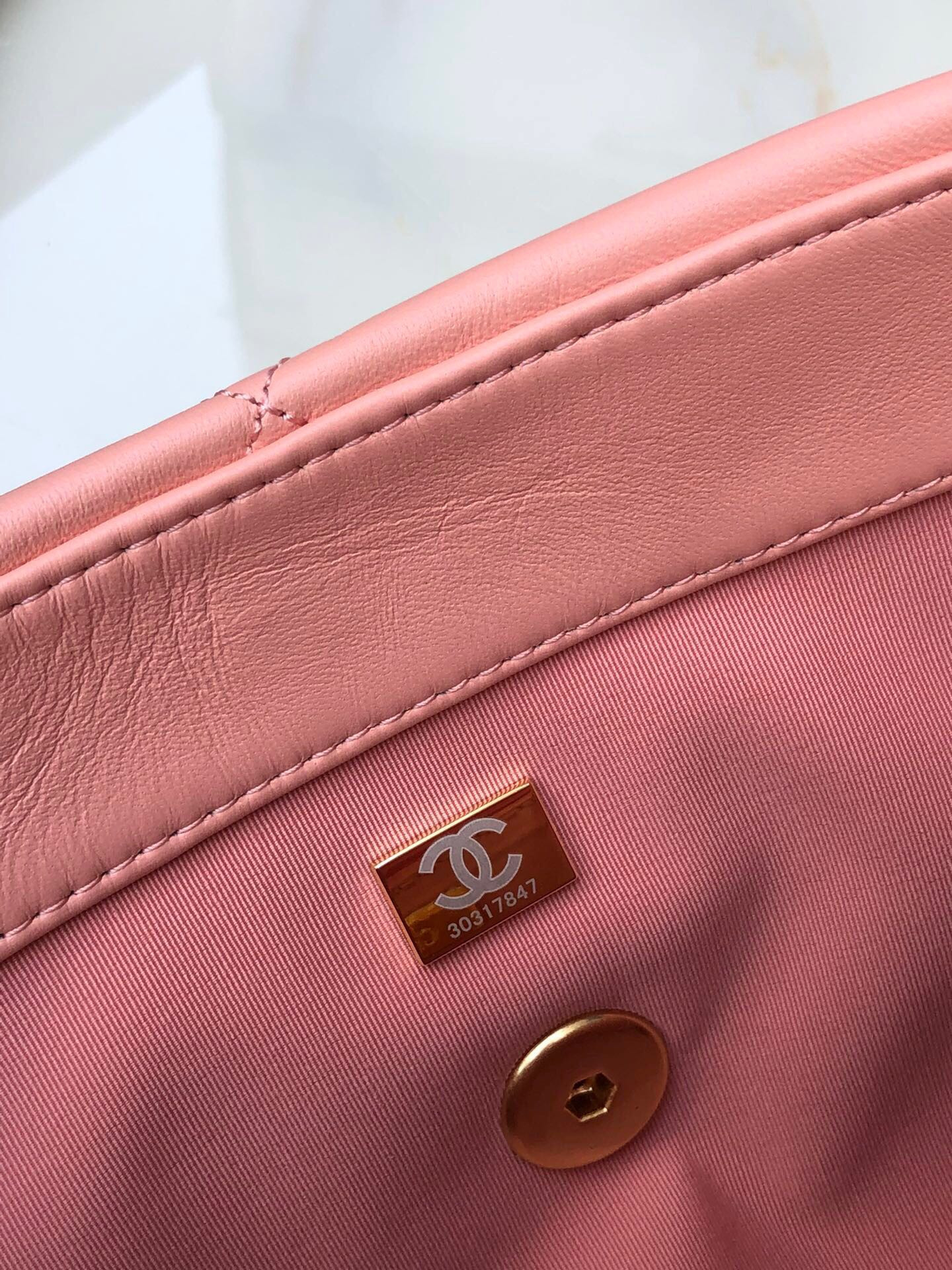 CHANEL 19 LARGE HANDBAG Shiny Leather, Gold-Tone, Silver-Tone & Ruthenium-Finish Metal Light Pink 7.8 × 11.7 × 3.9 in