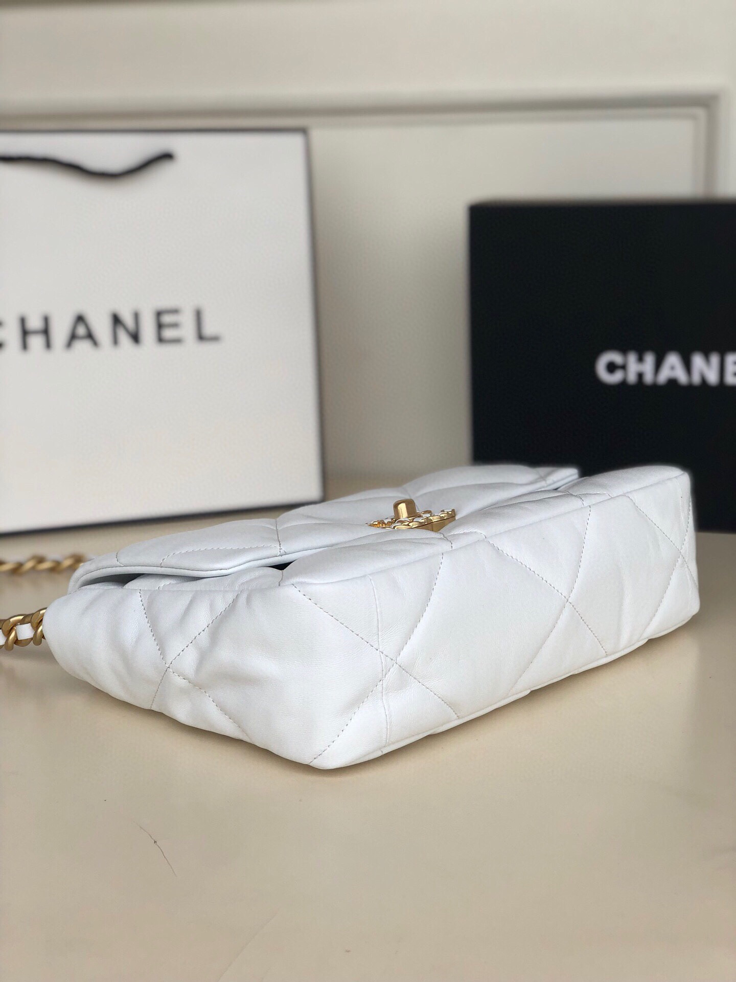 CHANEL 19 LARGE HANDBAG Shiny Leather, Gold-Tone, Silver-Tone & Ruthenium-Finish Metal White 7.8 × 11.7 × 3.9 in