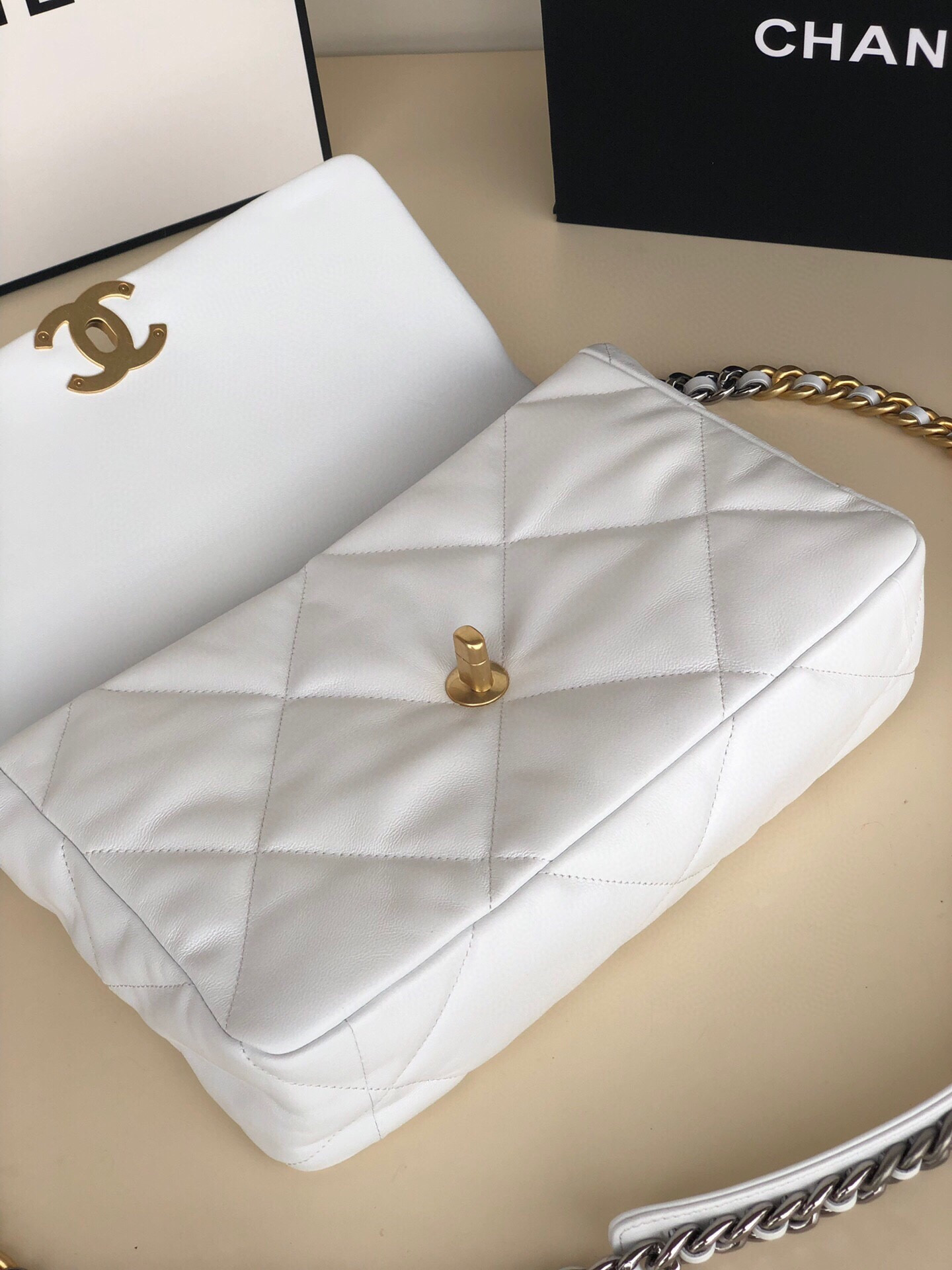 CHANEL 19 LARGE HANDBAG Shiny Leather, Gold-Tone, Silver-Tone & Ruthenium-Finish Metal White 7.8 × 11.7 × 3.9 in