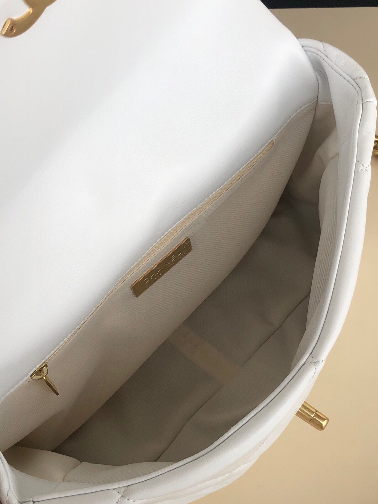 CHANEL 19 LARGE HANDBAG Shiny Leather, Gold-Tone, Silver-Tone & Ruthenium-Finish Metal White 7.8 × 11.7 × 3.9 in