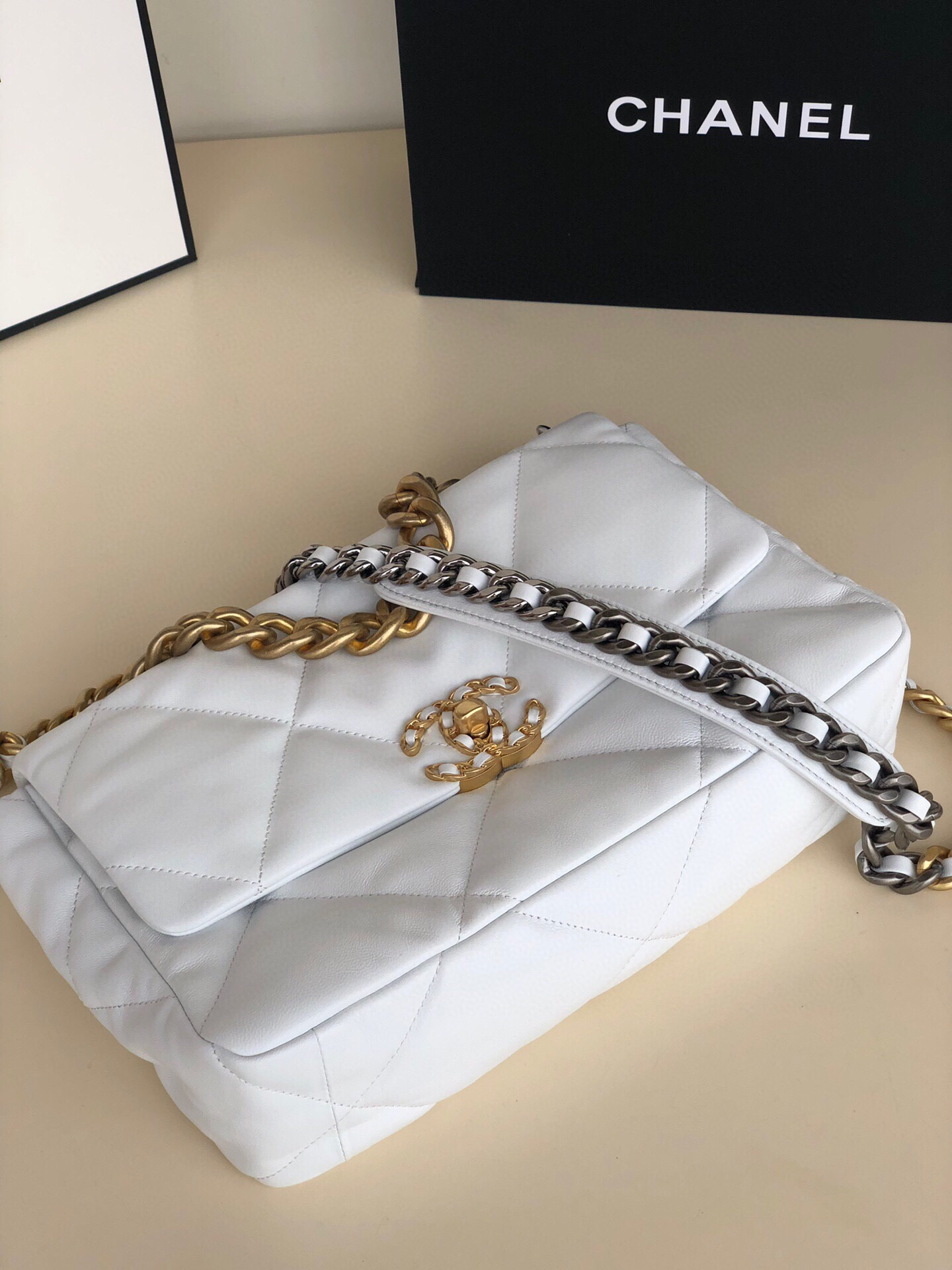CHANEL 19 LARGE HANDBAG Shiny Leather, Gold-Tone, Silver-Tone & Ruthenium-Finish Metal White 7.8 × 11.7 × 3.9 in