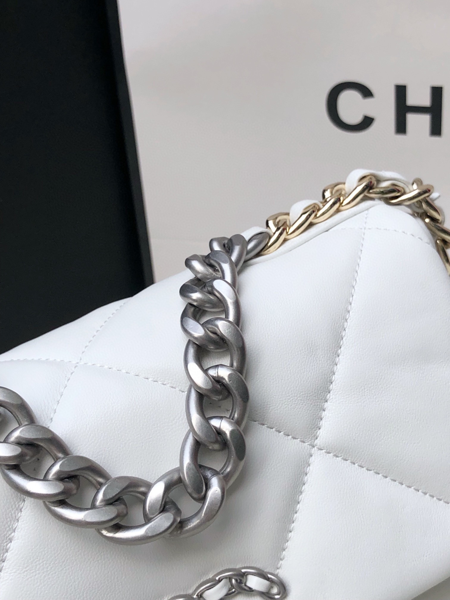 CHANEL 19 HANDBAG Shiny Leather, Gold-Tone, Silver-Tone & Ruthenium-Finish Metal White 6.2 × 10.1 × 3.5 in