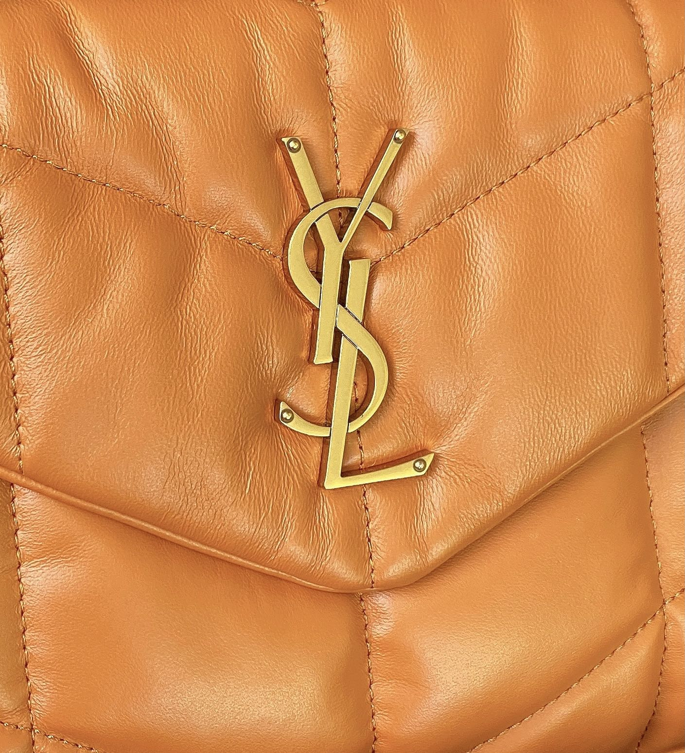 YSL PUFFER SMALL IN NAPPA LEATHER ORANGE 11.4 X 6.6 X 4.3 INCHES